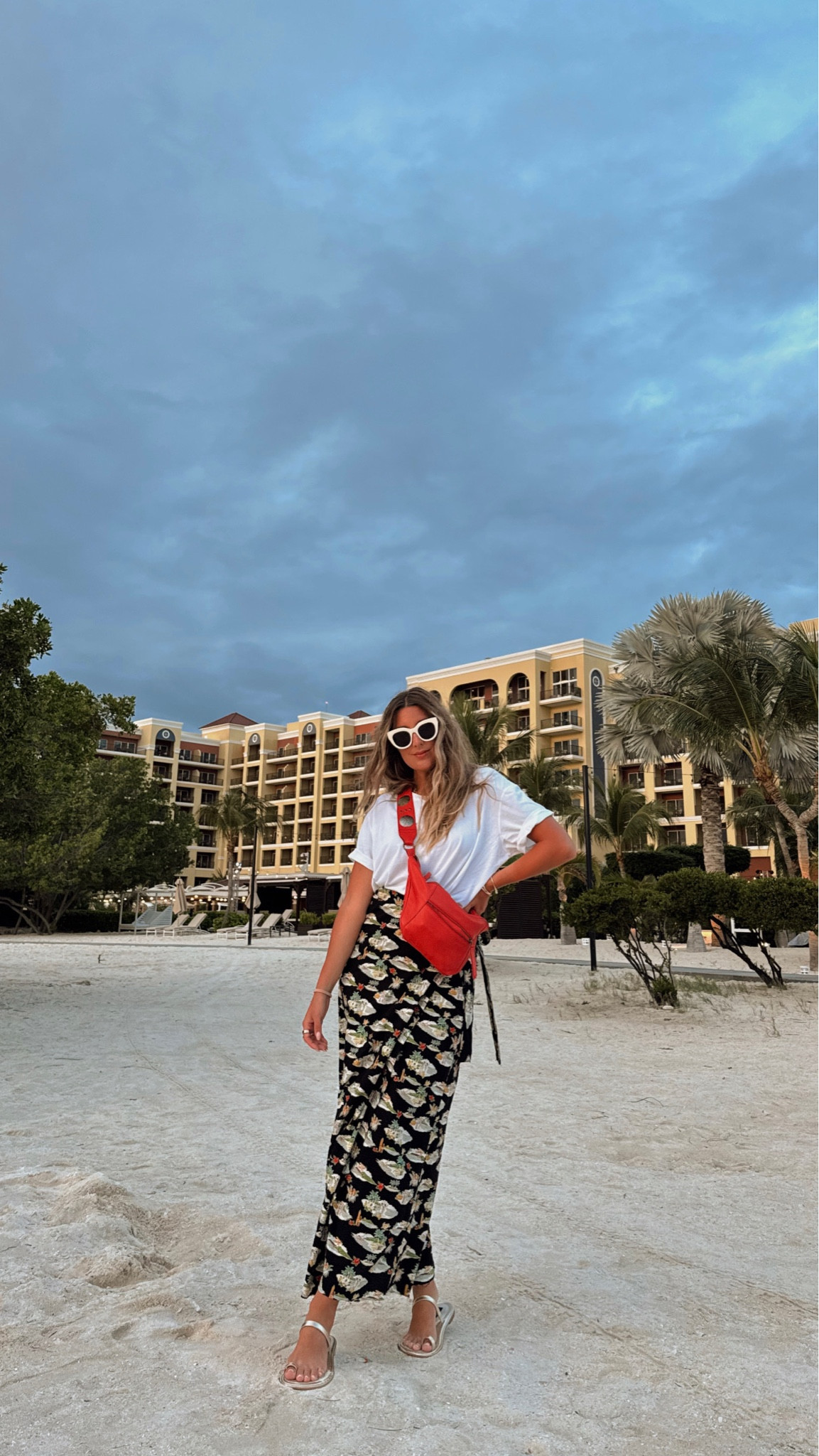 Easy outfit for vacation + this skirt can double has a cover up! Tshirt is my brand avail on howdoyouwearthatshop.com!