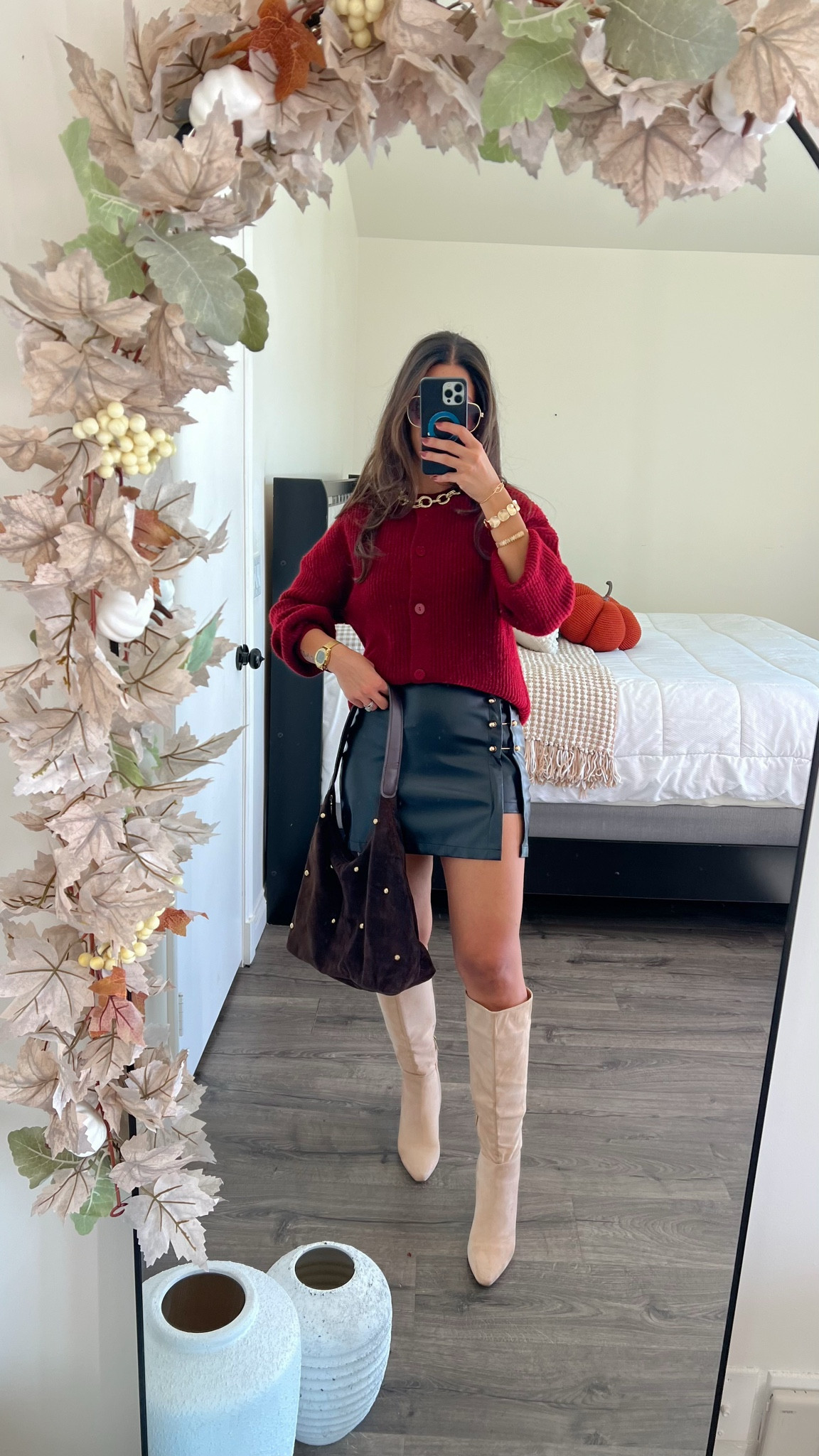 Casual sheet Thanksgiving outfit idea wearing small in the leather skirt and cardigan

#LTKSeasonal #LTKFindsUnder50 #LTKStyleTip