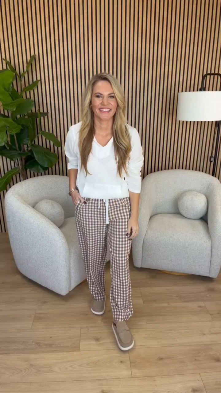 Give me all the cute casual outfits for fall! This white lightweight hoodie paired with brown and white gingham drawstring pants is such an easy combination. I love the relaxed fit of the pants, and the neutral slip on loafers make it perfect for running errands, working from home, or a casual day out. Comfortable without having to sacrifice a cute outfit!

Sizing: 5’3” | Medium hoodie | Medium pants | Size 7.5 shoes

White lightweight hoodie, brown gingham pants, checkered wide leg pants, women’s casual fall fashion, drawstring lounge pants, neutral slip on loafers, comfortable everyday outfits, petite casual style, fall lounge outfits, women’s matching separates, Audrie Dollins