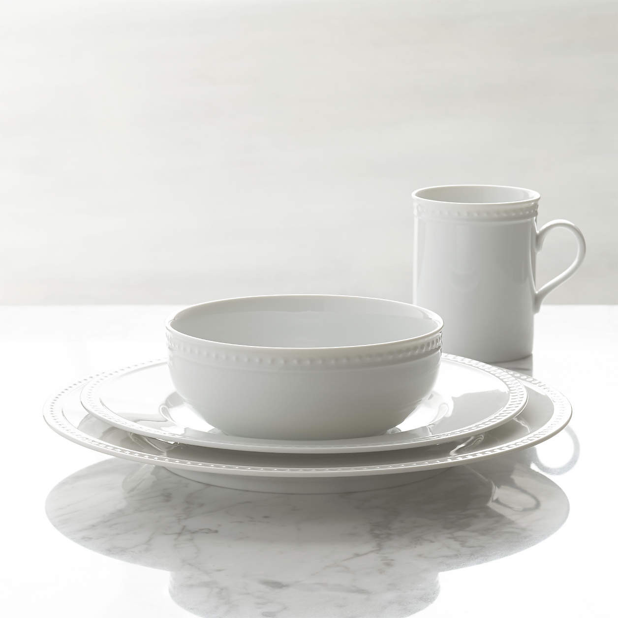 Staccato White Porcelain 4-Piece Place Setting + Reviews | Crate & Barrel | Crate & Barrel