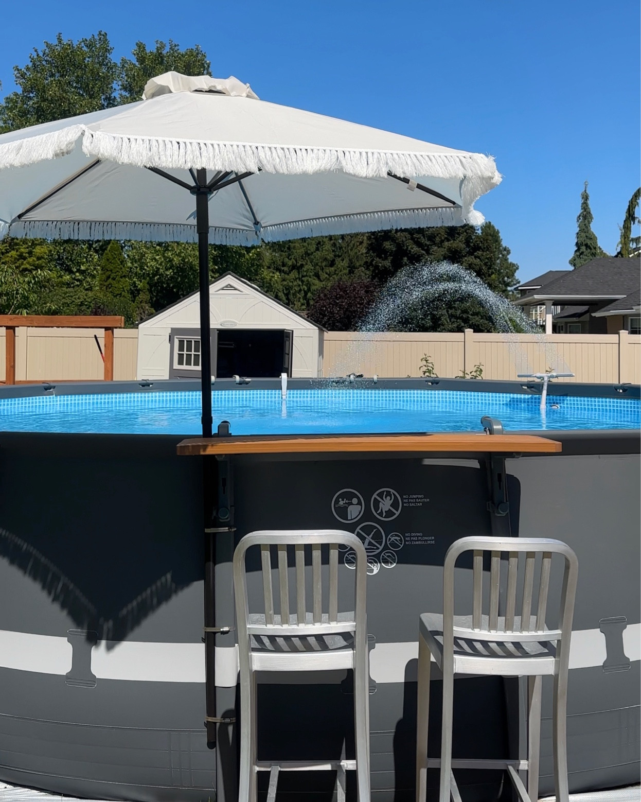 Above ground pool finds, pool bar, umbrella, pool fountain