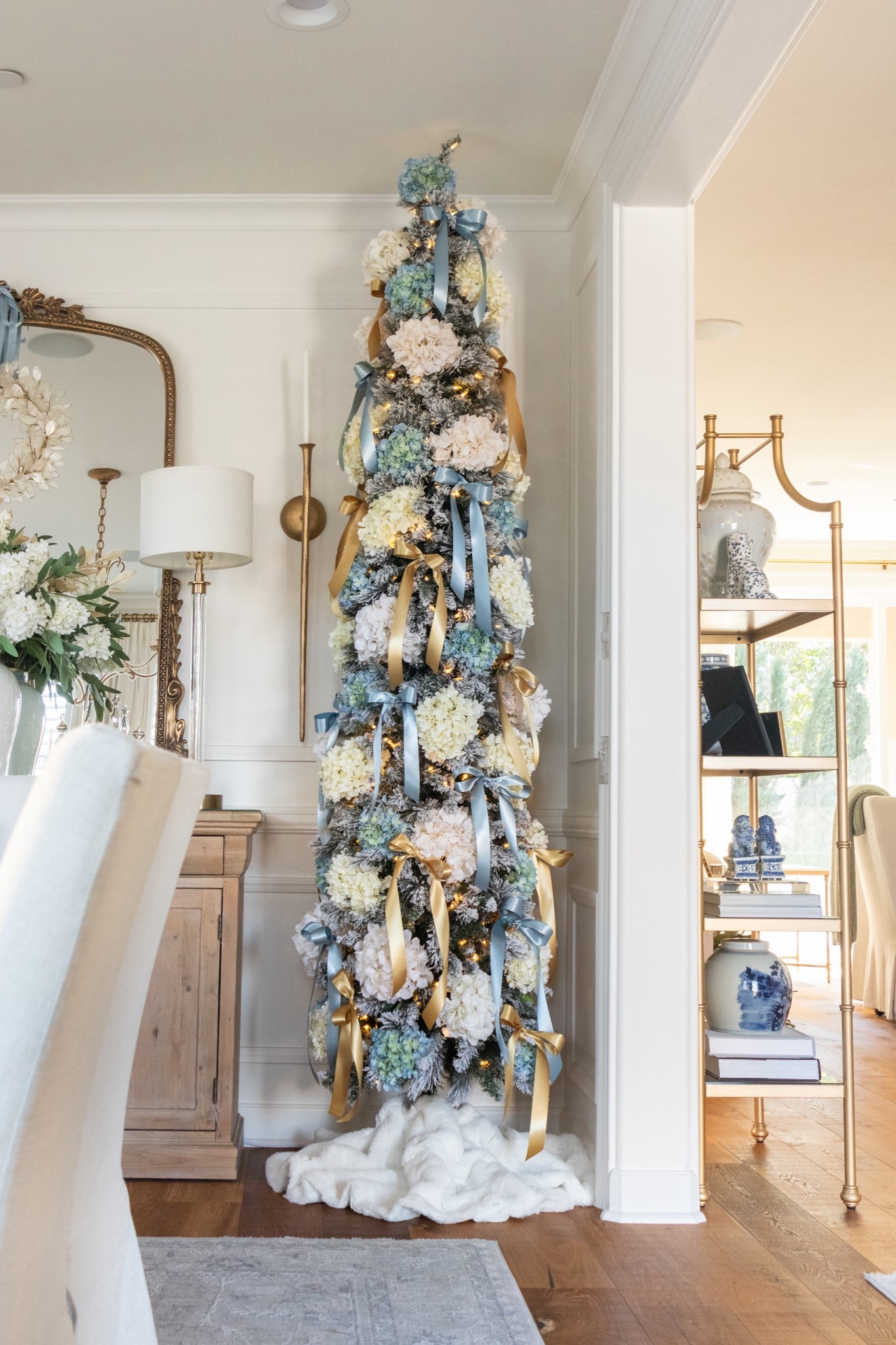 Shop my Christmas dining room here🤍 holiday, seasonal, home decor, winter, Christmas tree, blue and white, bows 

#LTKStyleTip #LTKHome #LTKSeasonal
