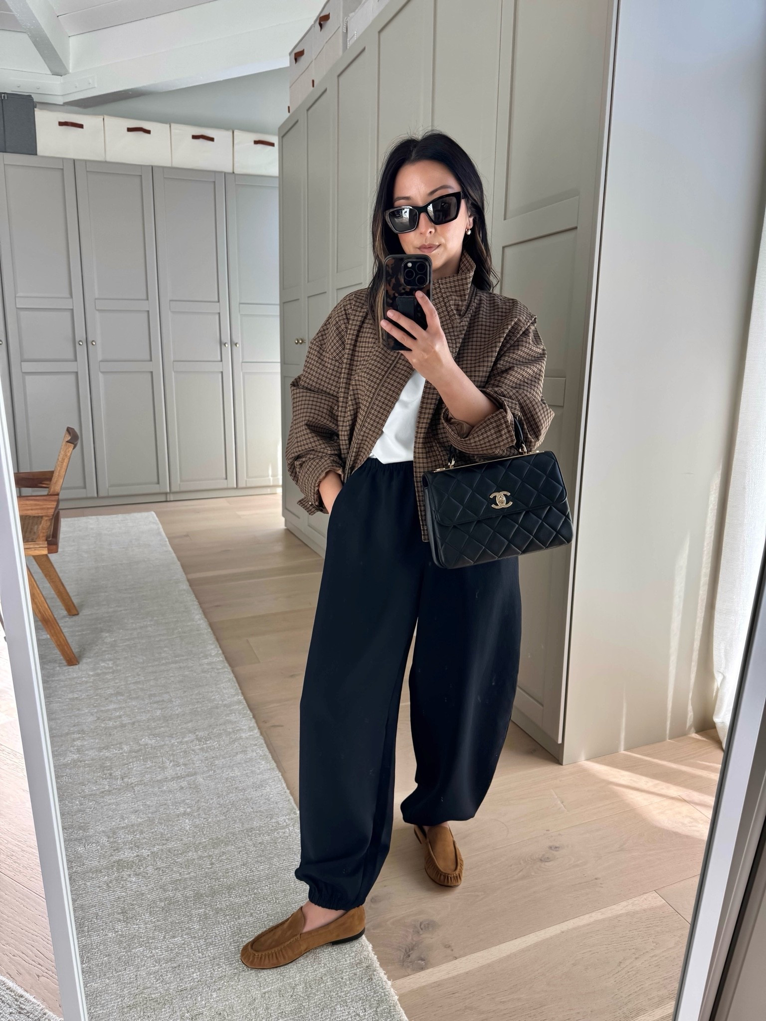 This years trend jacket - check funnel neck. This jacket is right up my alley bc I love a funnel neck and this color is the color of the season. Arms run wide 

Mango jacket xs
Aritzia tee medium
Aritzia balloon pants xs
Vince loafers 5
Chanel trendy cc small
YSL sunglasses
Dorsey James necklace 15”
Dorsey Cecilia earrings 3.4