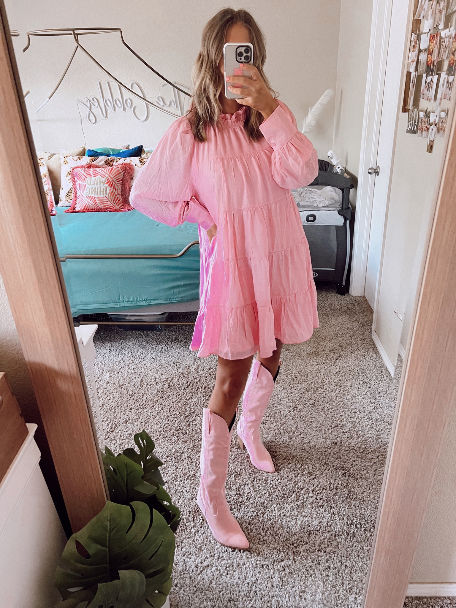Pink tiered flowy dress paired with pink cowboy boots 

#LTKstyletip #LTKunder100 #LTKshoecrush