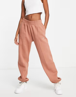 Nike Collection Fleece loose fit cuffed sweatpants in brown - BROWN | ASOS (Global)