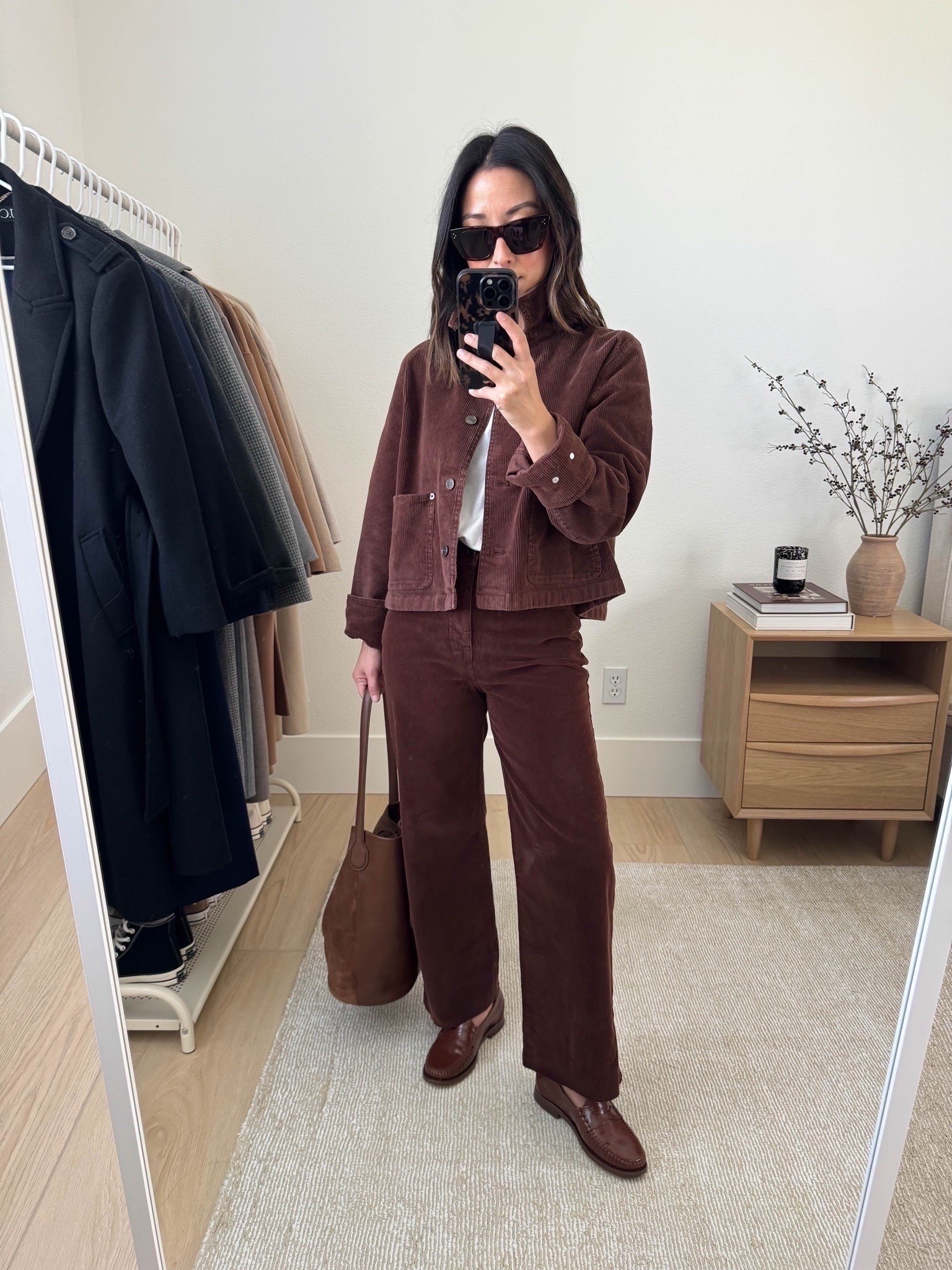 Fall outfits from J.Crew. Swing barn jacket is SO GOOD! Love the fit of this so much. Sized up to a small for a roomy fit. Also, these slim wide pants - I originally got them in the regular length to wear them full length. But after styling, I realized I liked them more cropped, so I cut the hems. These do come in petite lengths, so you don't have to cut them. 

J.Crew swing barn jacket small
J.Crew tee small
J.Crew corduroy slim wide jeans 25, cut hems. But come in petites.
J.Crew loafers 5
J.Crew bucket bag
Celine sunglasses

Fall outfits, fall style, petite style 



#LTKSeasonal #LTKSaleAlert #LTKPetite