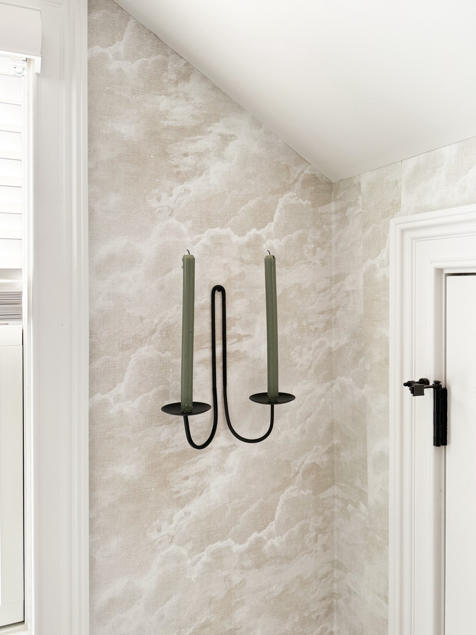 This wallpaper detail brings so much softness and movement to the space, almost like a subtle cloud wash that elevates the entire room. The simple black sconce with taper candles adds just enough contrast to keep it feeling modern while still warm and inviting. A perfect balance of texture, tone, and minimal styling.

bathroom wallpaper ideas, neutral wallpaper design, modern cottage style, wall sconce styling, taper candle decor, soft neutral interiors, bathroom design inspiration, textured wall finish, elevated minimal decor, cozy home details girlonthehudson

#LTKdayinmylife #LTKSeasonal #LTKHome