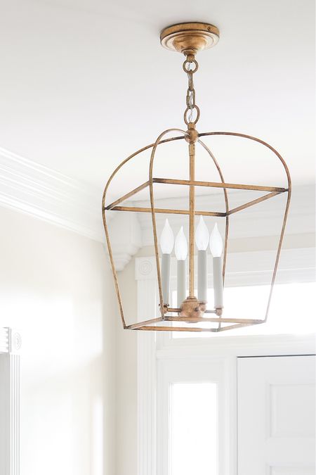 My front entry light fixture is classic with a lovely thin brass form.

#LTKHome
