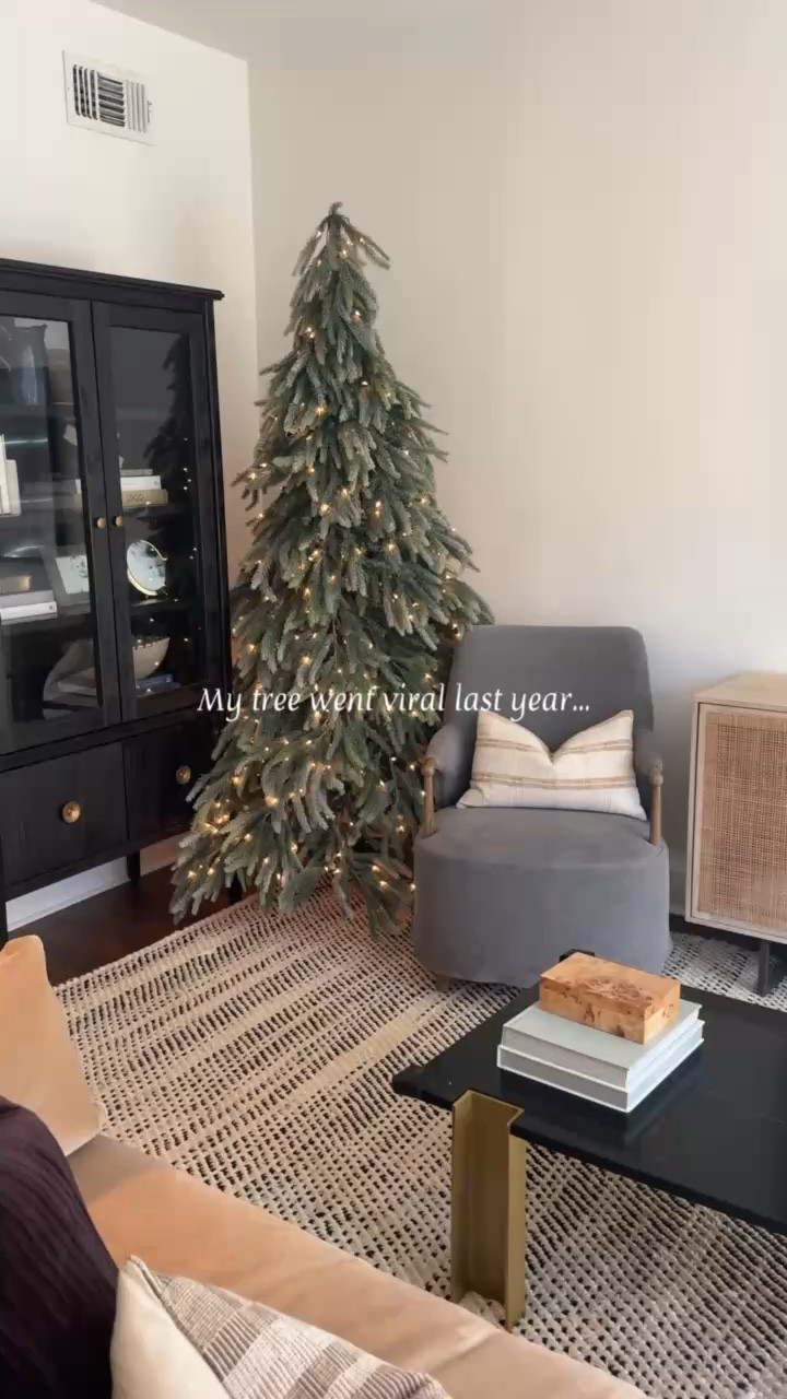 Our 2025 tree🎄✨ 

I had this down swept tree on my wishlist for awhile & got it last year for our first Christmas in our new home. I love that it is mostly green, with a light flocking that feels nostalgic in a way. I wanted it to feel collected & fit in well with our almost 100 year old house. I love how it turned out & can’t wait to continue to add to it over the years! 

Growing up we always had one green tree in our family room for Santa presents & a flocked one for wrapped gifts in our formal living room. This one will serve as our more formal one where I’ll put our wrapped gifts & the more fun tree is in the playroom for the kids! 

#LTKSeasonal #LTKHome #LTKHoliday