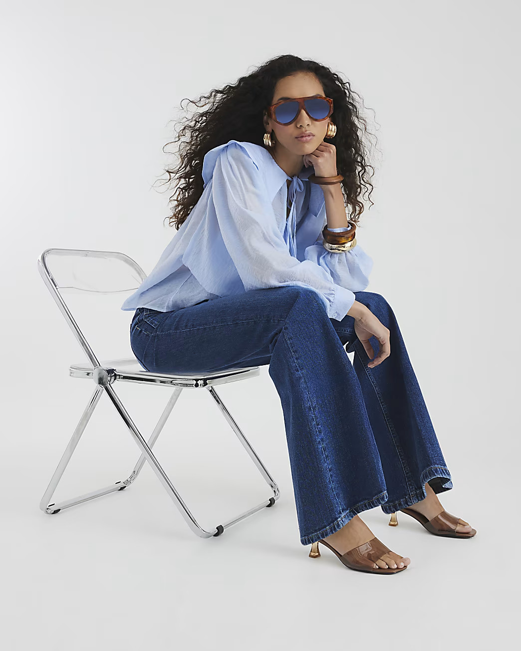 Blue Denim High rise Relaxed Flared Jeans | River Island UK & IE