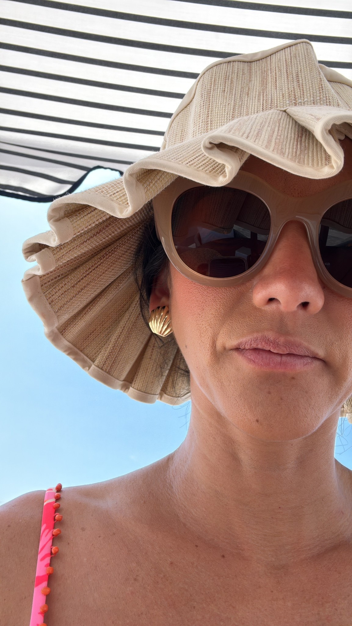 Lantern hat 👒,my go-to Amazon sunglasses, seashell earrings 

#LTKSaleAlert #LTKSwim #LTKTravel