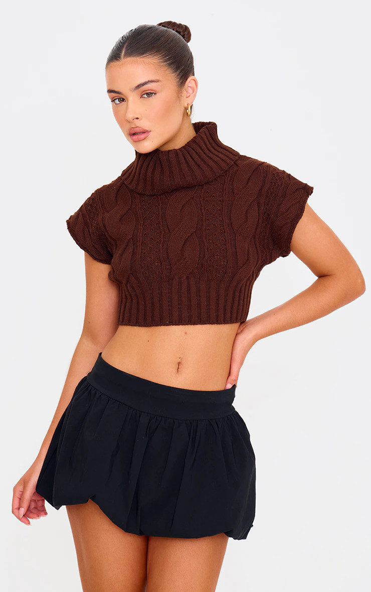 Chocolate Cable Knit Roll Neck Cap Sleeve Cropped Vest | PrettyLittleThing US