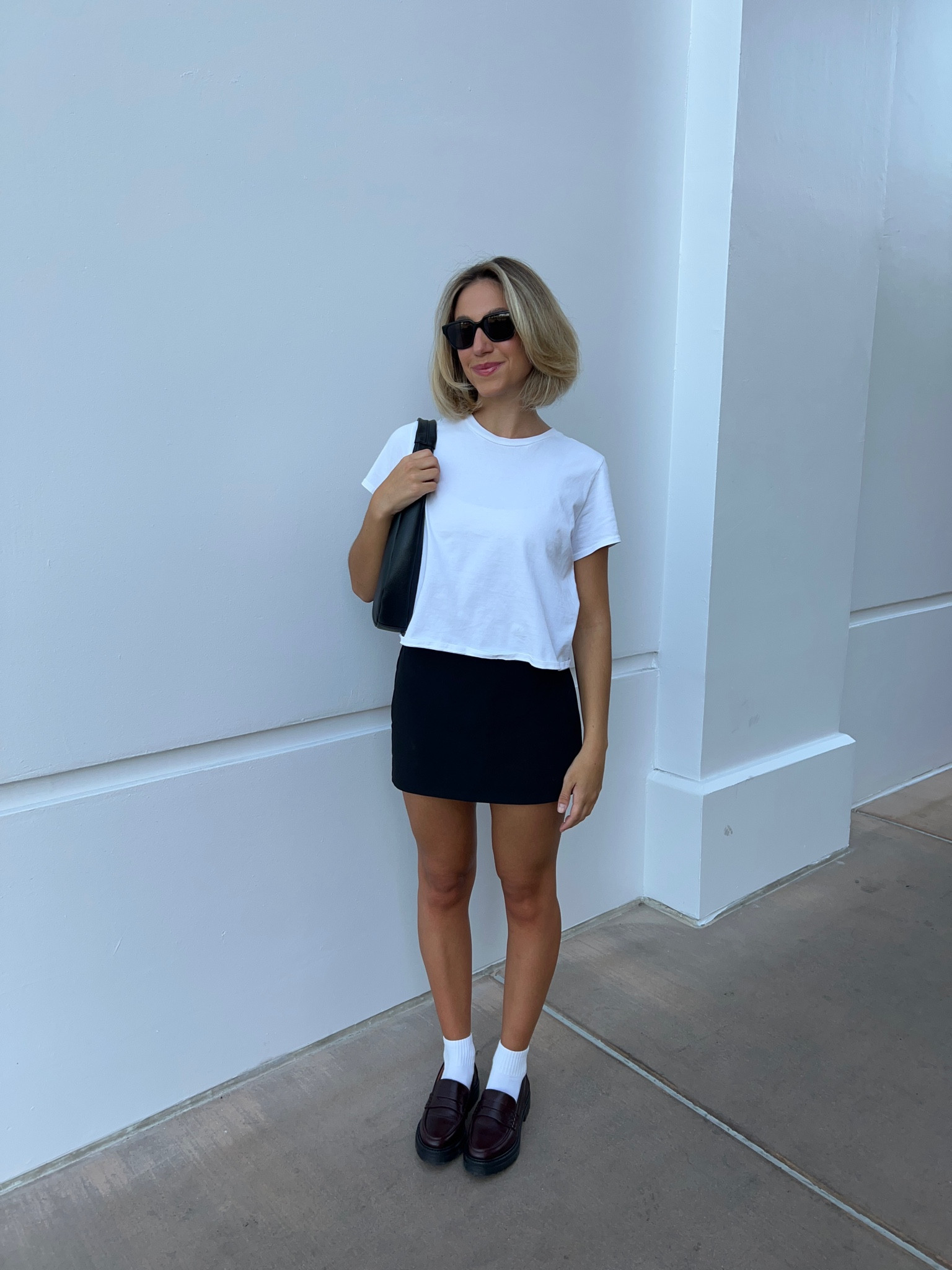 Fall outfit, fall style, white tee, white t-shirt, basic white tee, black skirt, black skort, black mini skirt, mini skirt, loafers, burgundy loafers
