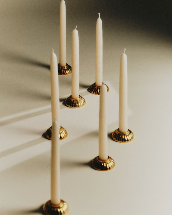 The prettiest candle holder set - comes with 2 brass candles and 2 natural candles. Great hostess gift idea. 

#LTKHoliday #LTKGiftGuide #LTKselfcare