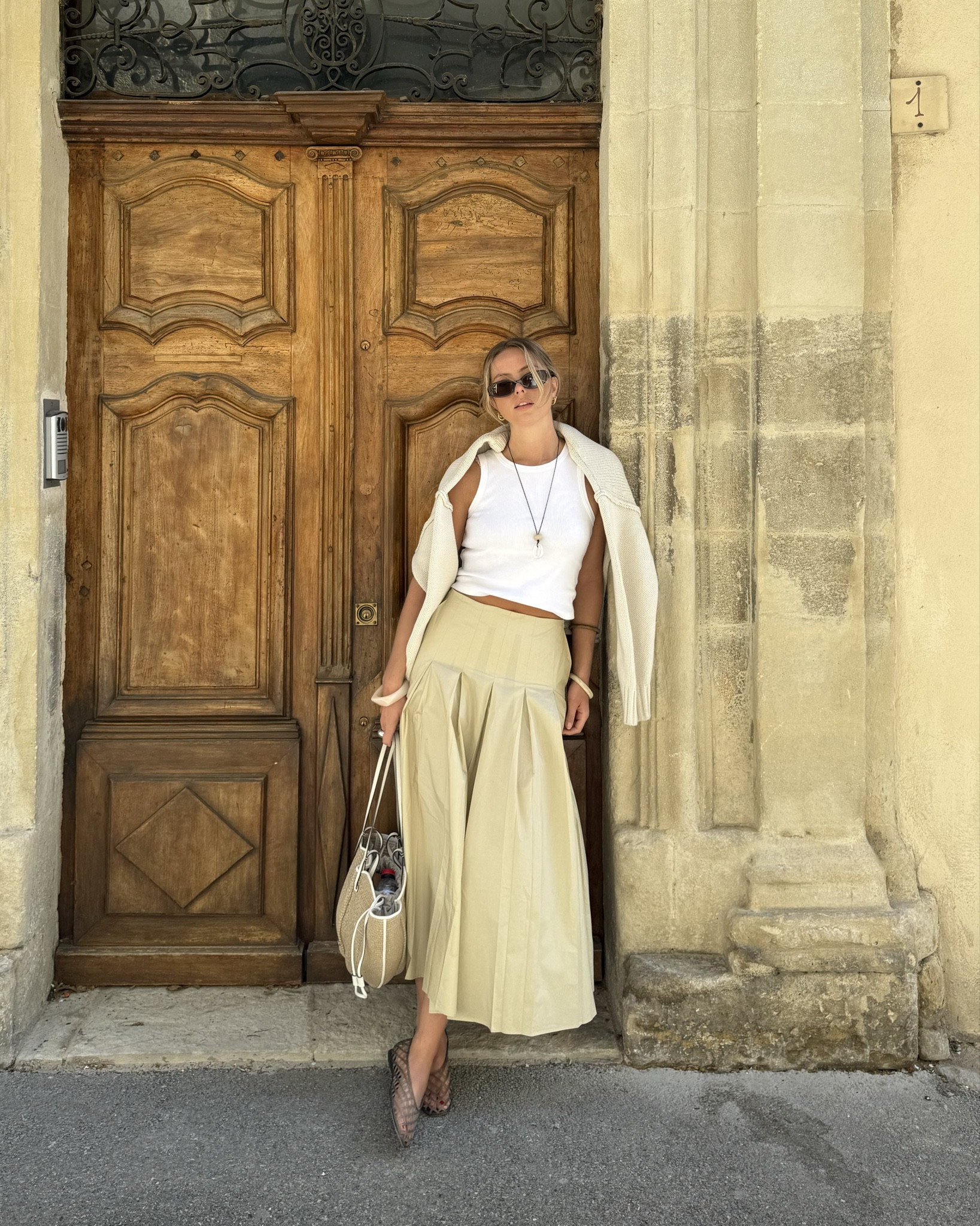An easy spring summer neutral outfit 

Massimo Dutti, cotton skirt, pleated skirt, summer skirt, midi skirt, neautral style, dissh, Roy jumper, cotton knit, jelly shoes, raffia bag, summer bag, white tank top, racer tank, cord necklace, asos, simple style, summer style, summer outfit 

#LTKspring #LTKsummer #LTKuk