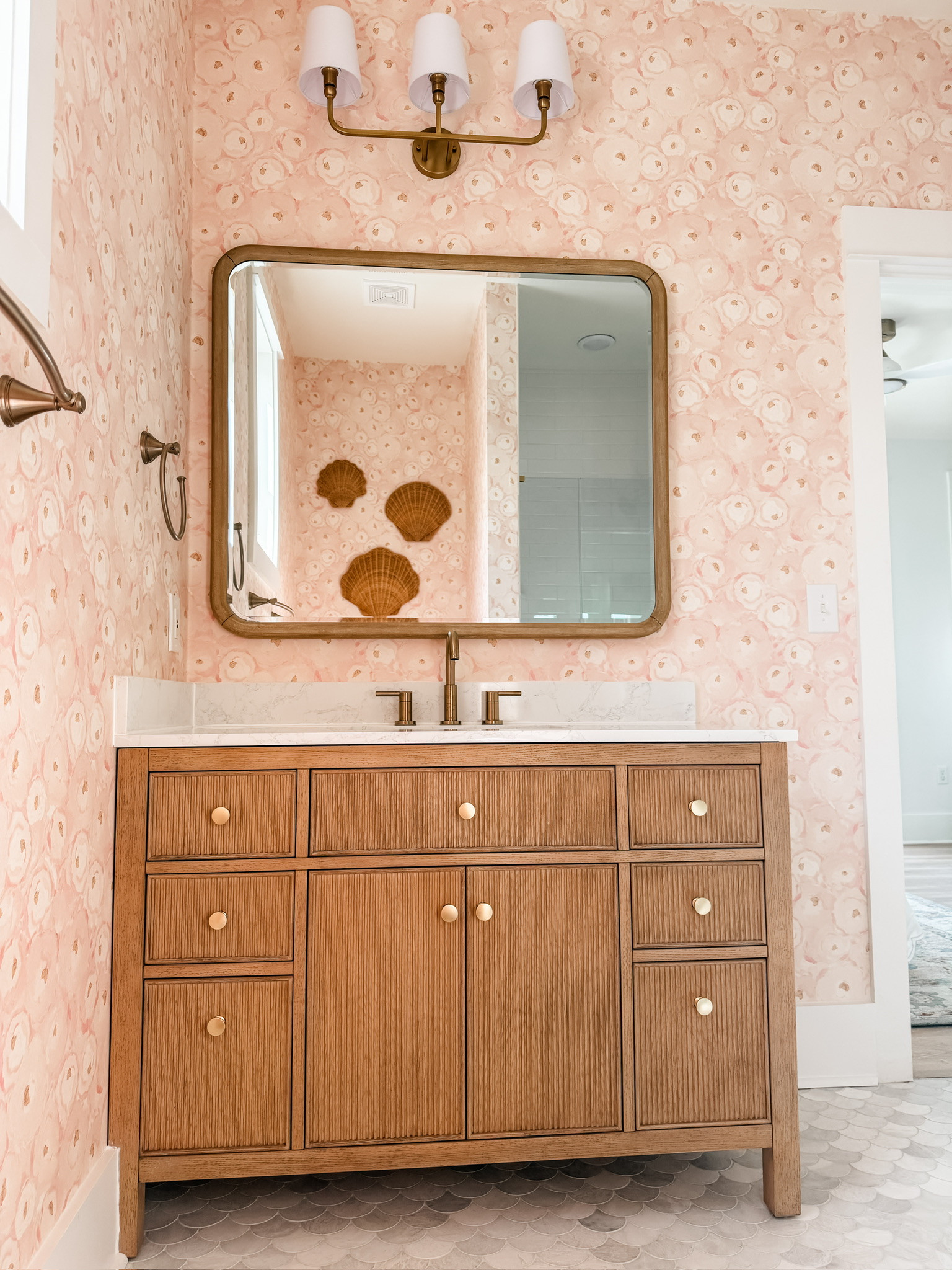 How cute is this pink wallpaper in the girls bathroom?! This vanity isn't linkable, but it's from Tennant Brand. It's part of of their Benton Collection.

Loverly Grey, home finds, home decor, bathroom inspo, beach house 

 #LTKHome
