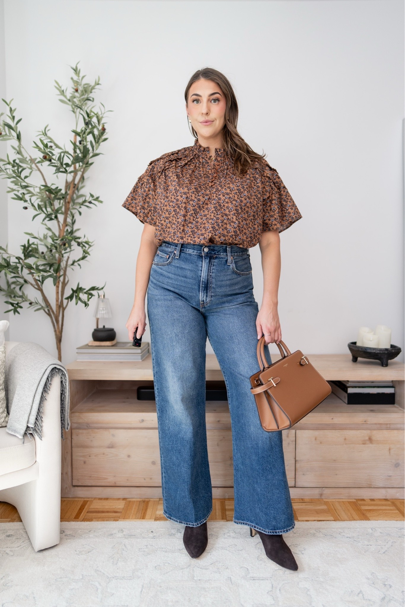Give me a pretty top, good jeans and ankle boots and I’m happy 🤎 This one feels so fall without trying too hard, and I love the little floral print with all the warm brown tones.

fall outfit idea, floral blouse, wide leg jeans, ankle boots, brown handbag, casual fall style, women’s fall fashion, everyday fall outfit

#LTKootd #LTKSeasonal #LTKMidsize