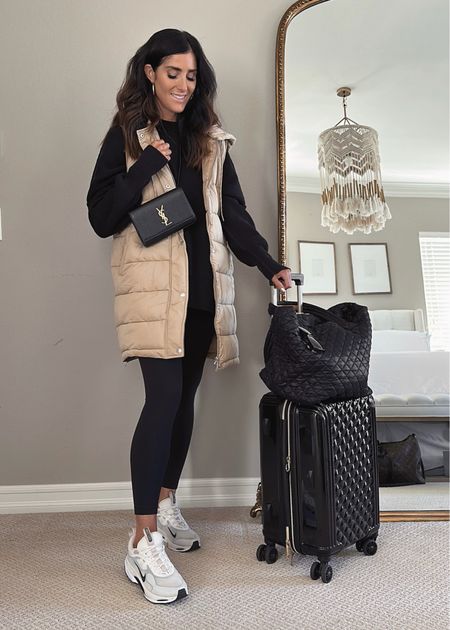 I’m just shy or 5’7 wearing the size Small puffer vest and XS sweater. 
Travel style, athleisure look, tote bag, StylinByAylin 

#LTKSeasonal #LTKunder100 #LTKstyletip