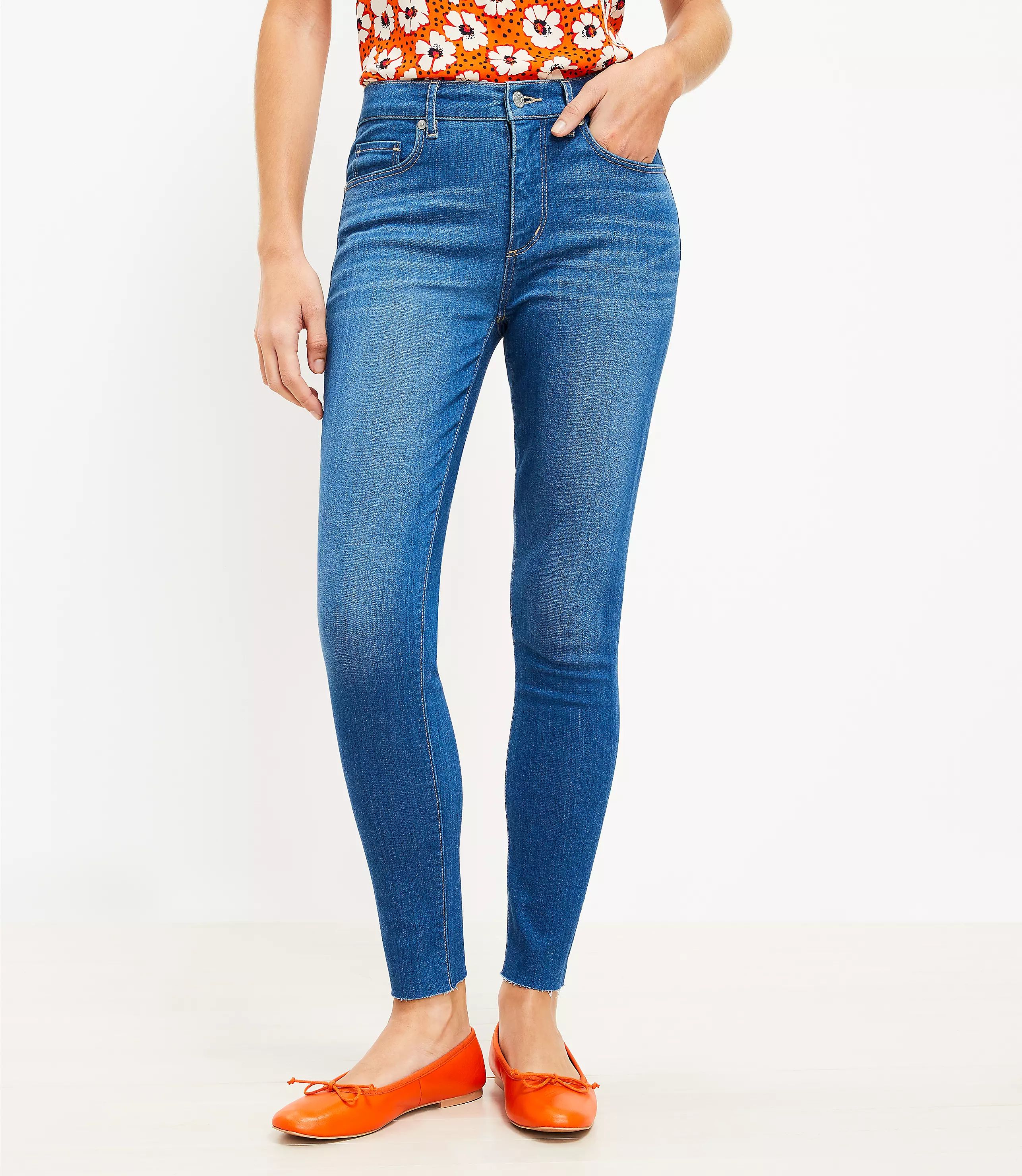 Chewed Hem Mid Rise Skinny Jeans in Bright Mid Vintage Wash | LOFT