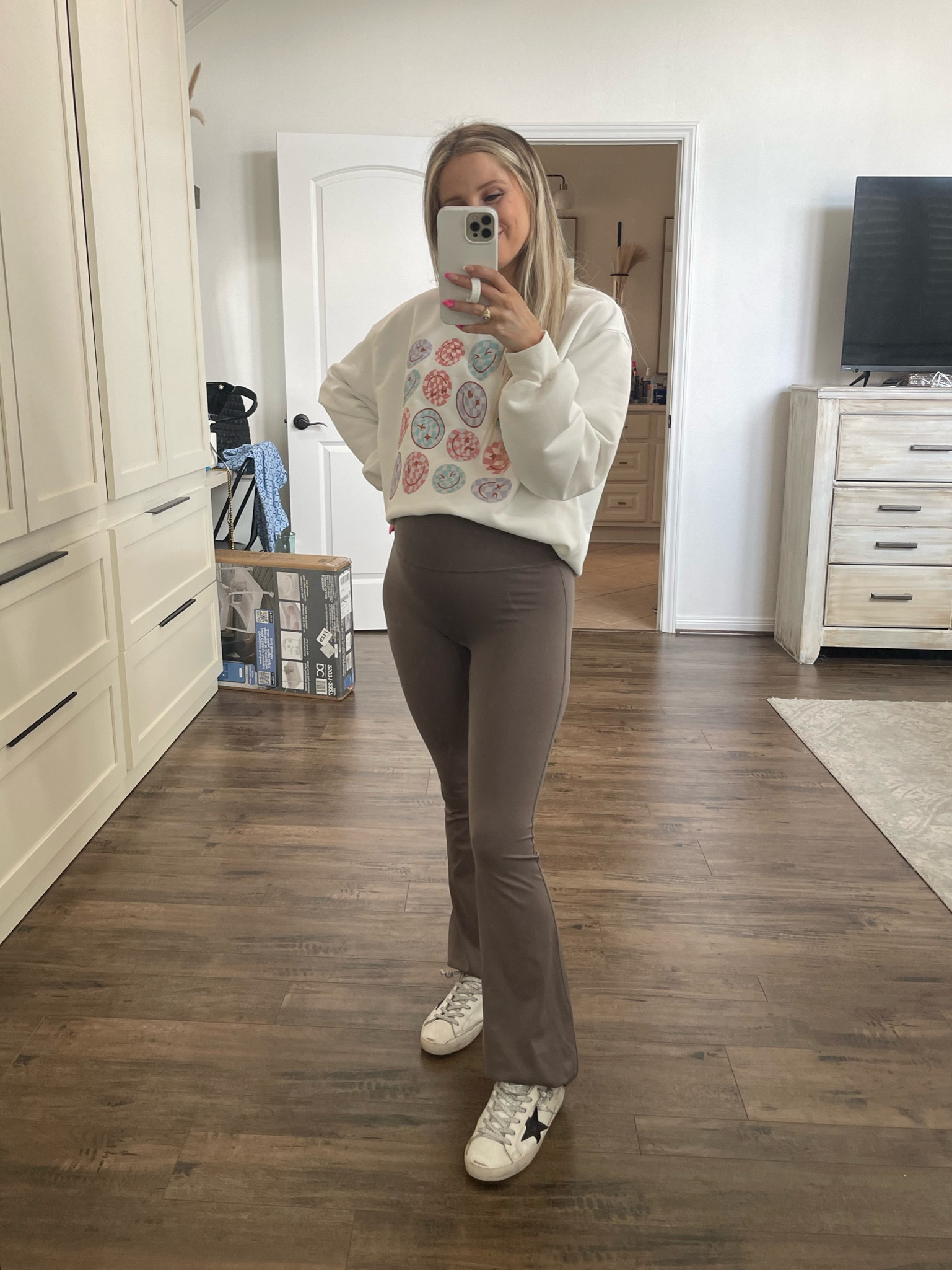 Casual look for the baby bump 

Target matching set. Target set. Flared leggings. Graphic sweatshirt. Smiley sweatshirt. 

#LTKbump #LTKFind #LTKfit