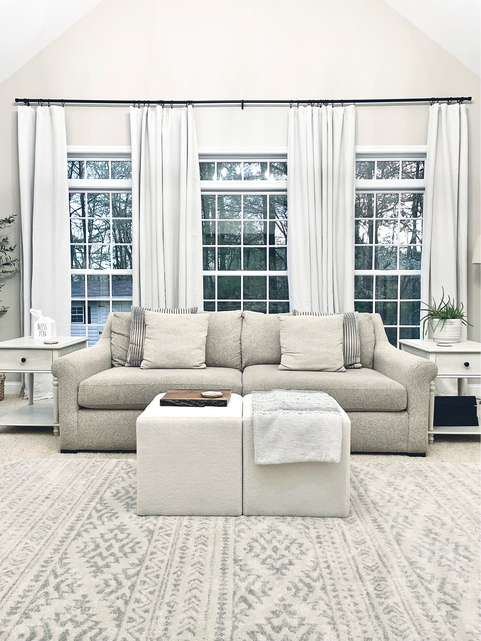 Neutral living room design 🤍🌿
In love with these new faux shearling ottoman cubes!