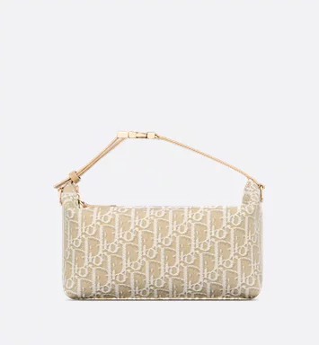 Medium DiorTravel Nomad Pouch Blue Dior Oblique Jacquard | DIOR | Christian Dior Parfums UK