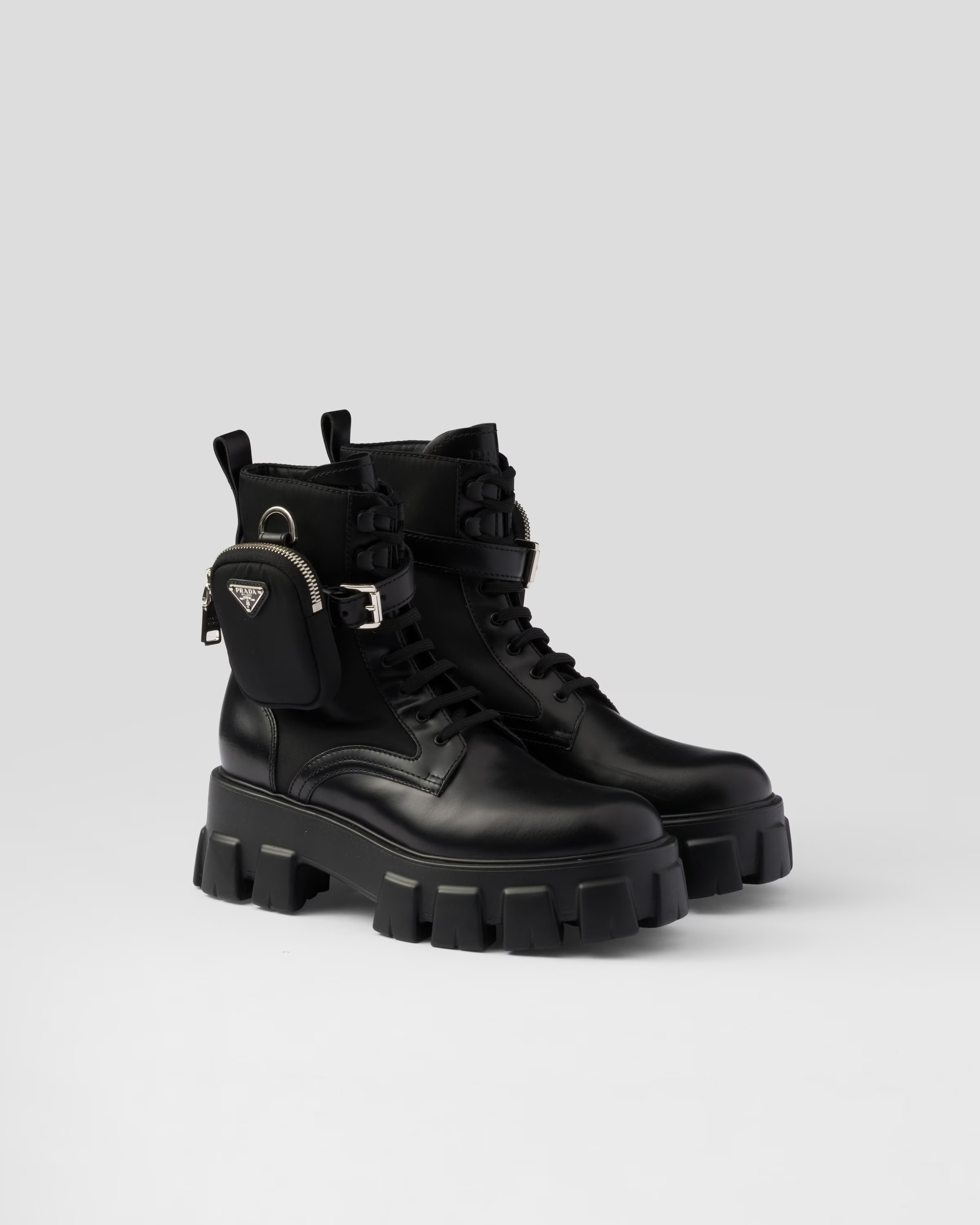 Black Monolith Leather And Re-nylon Boots With Pouch | PRADA | Prada Spa US