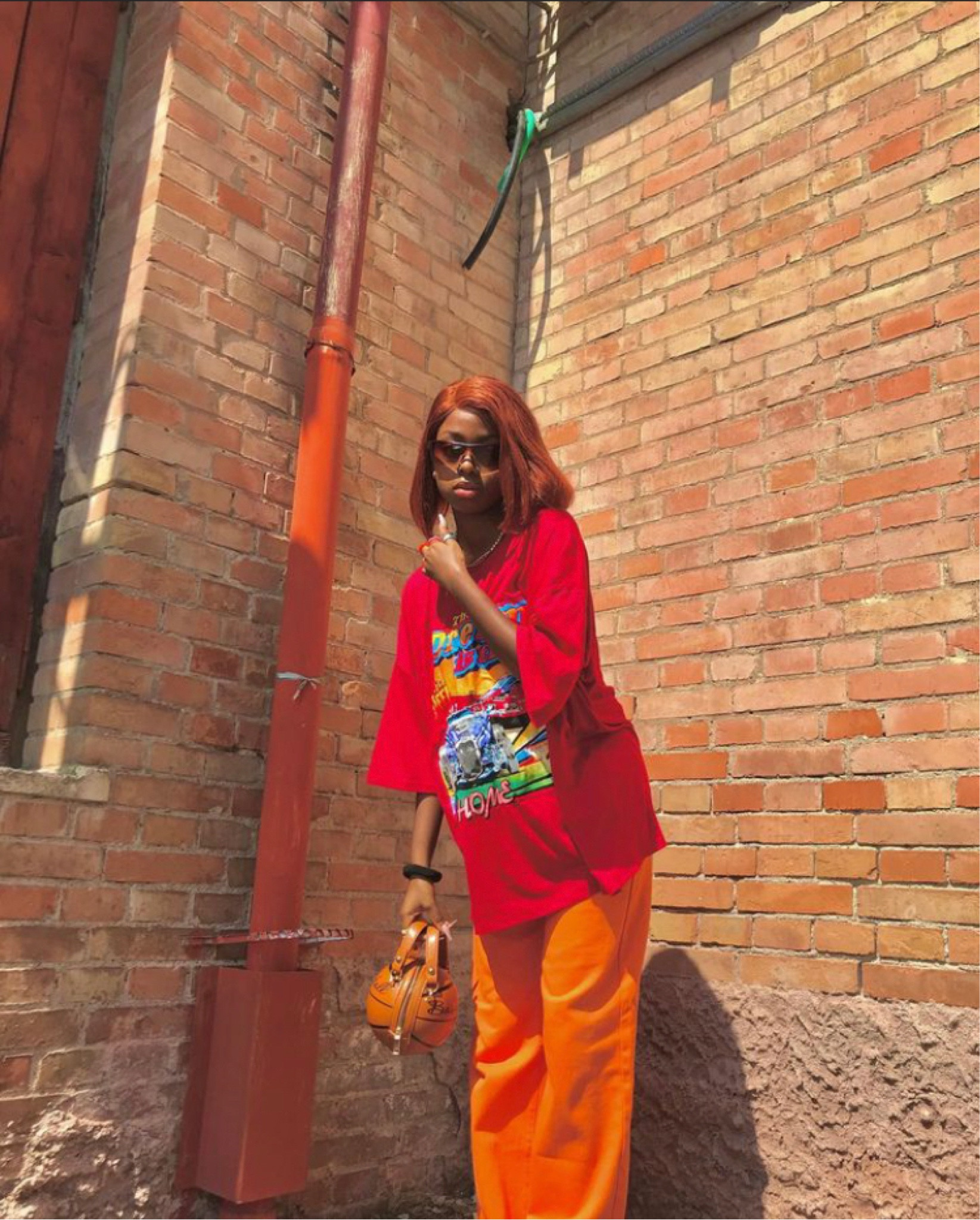 Streetwear , orange pant, orage, pants , basketball bag, t shirt , summer fit, summer streetwear , 

#LTKunder100 #LTKitbag #LTKfit