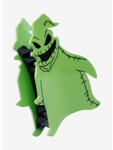 The Nightmare Before Christmas Oogie Boogie Glow-In-The-Dark Claw Hair Clip | Hot Topic | Hot Topic
