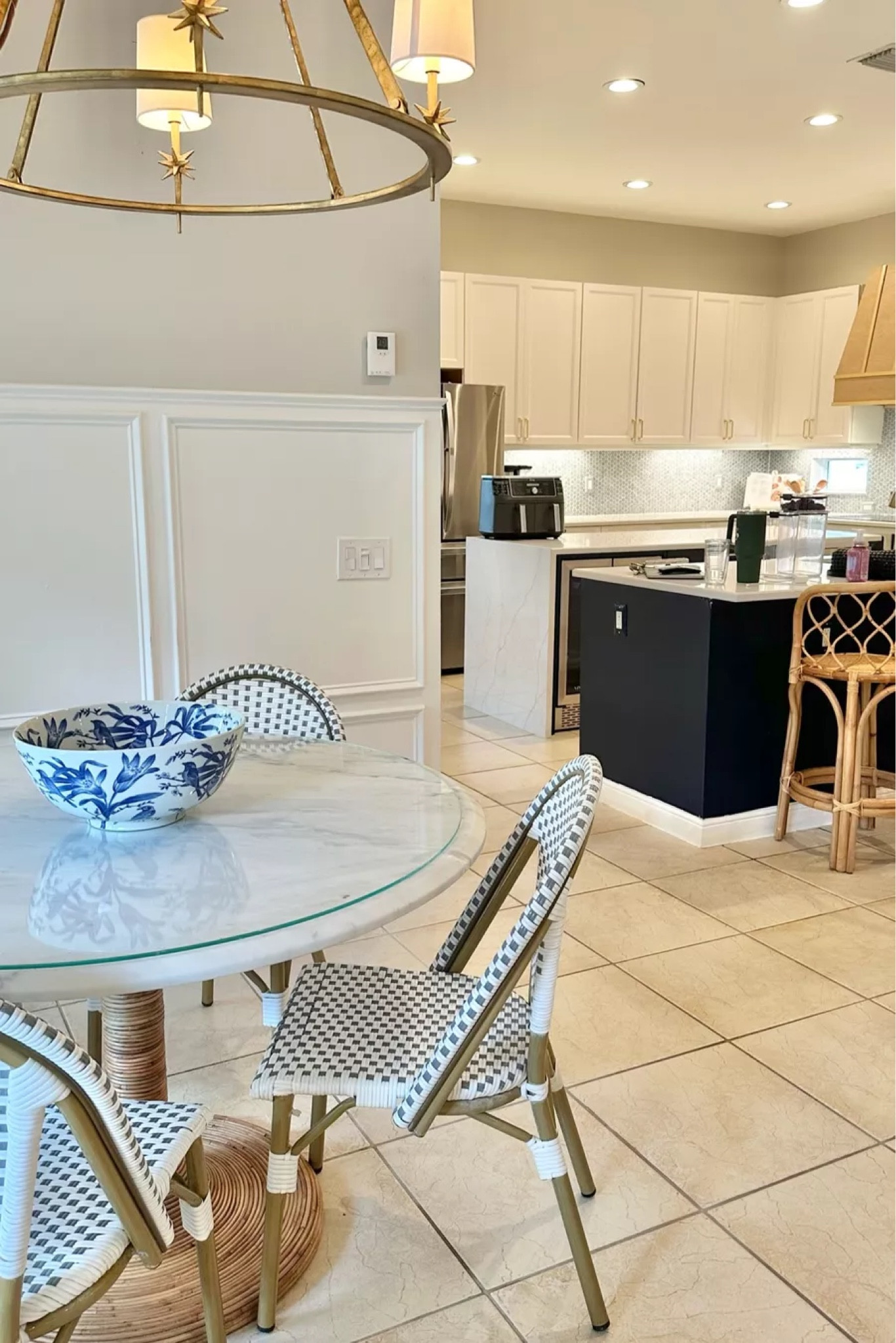 Eat in kitchen. Roman shades. Marble round white table. Bistro chairs

#LTKSaleAlert #LTKHome