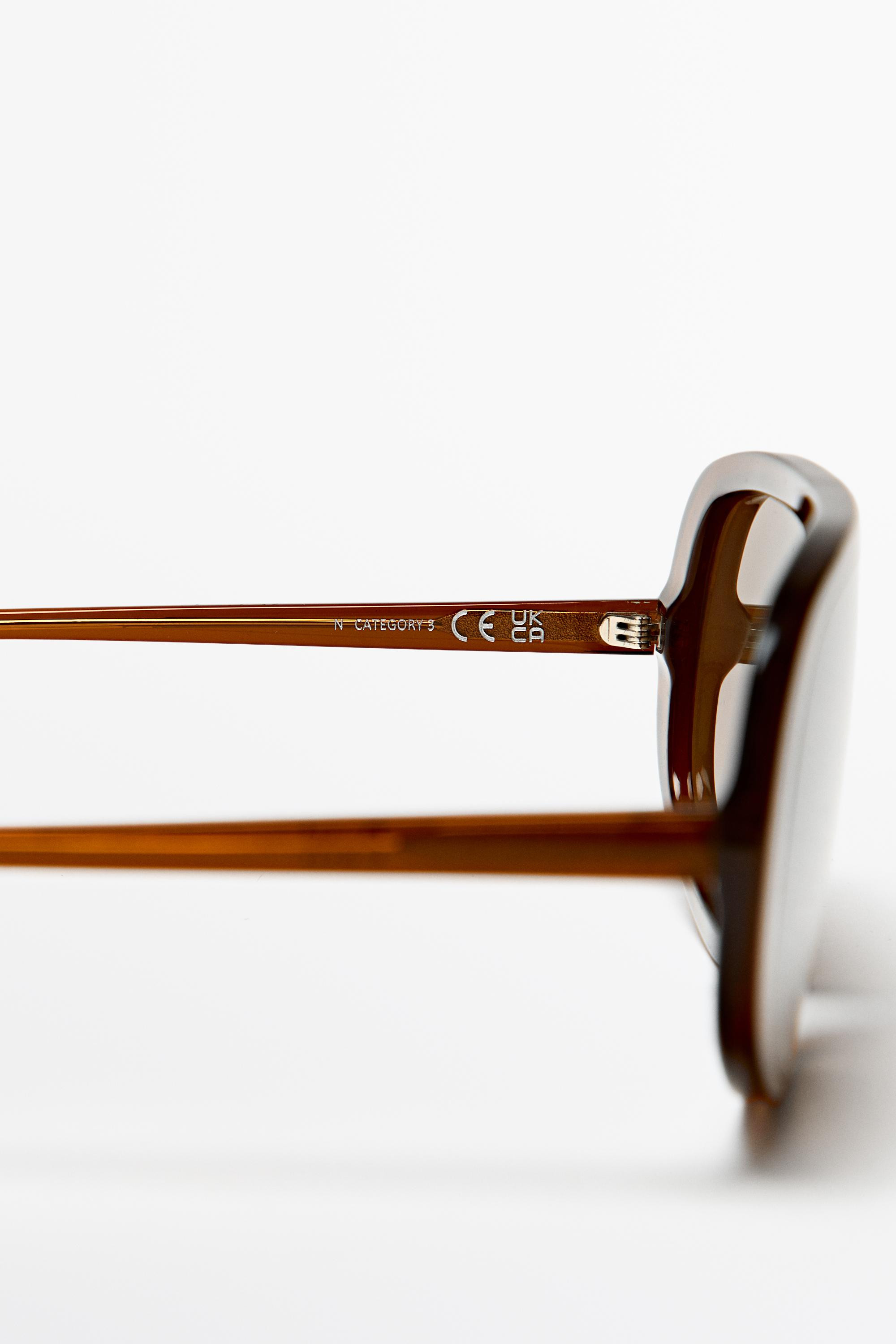 Sunglasses with a translucent frame. Oversized, wraparound design. Lenses with UV category 3 prot... | Zara US