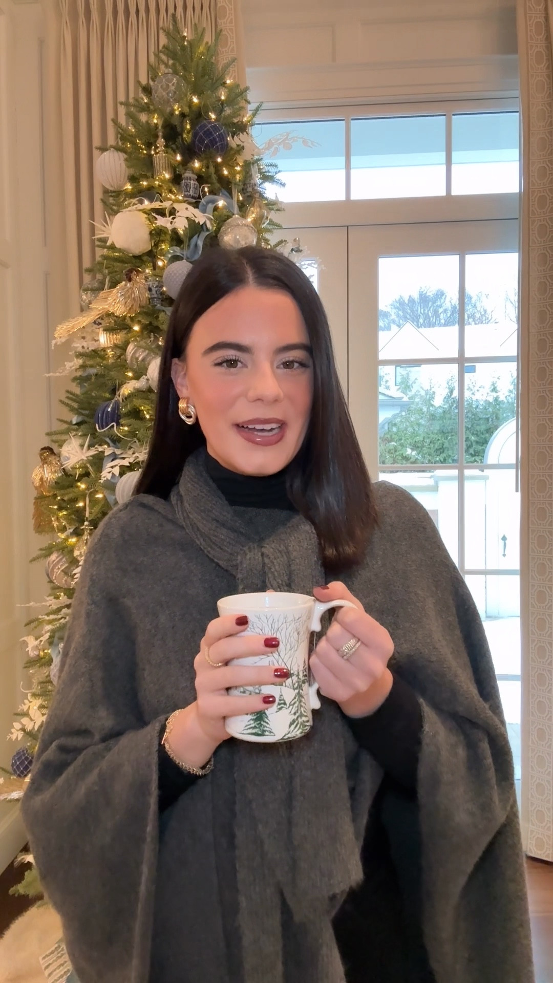 Love my new cape sweater from Bloomingdale’s perfect for winter! ❄️ Drinking out of the most festive cups from Juliska! 

