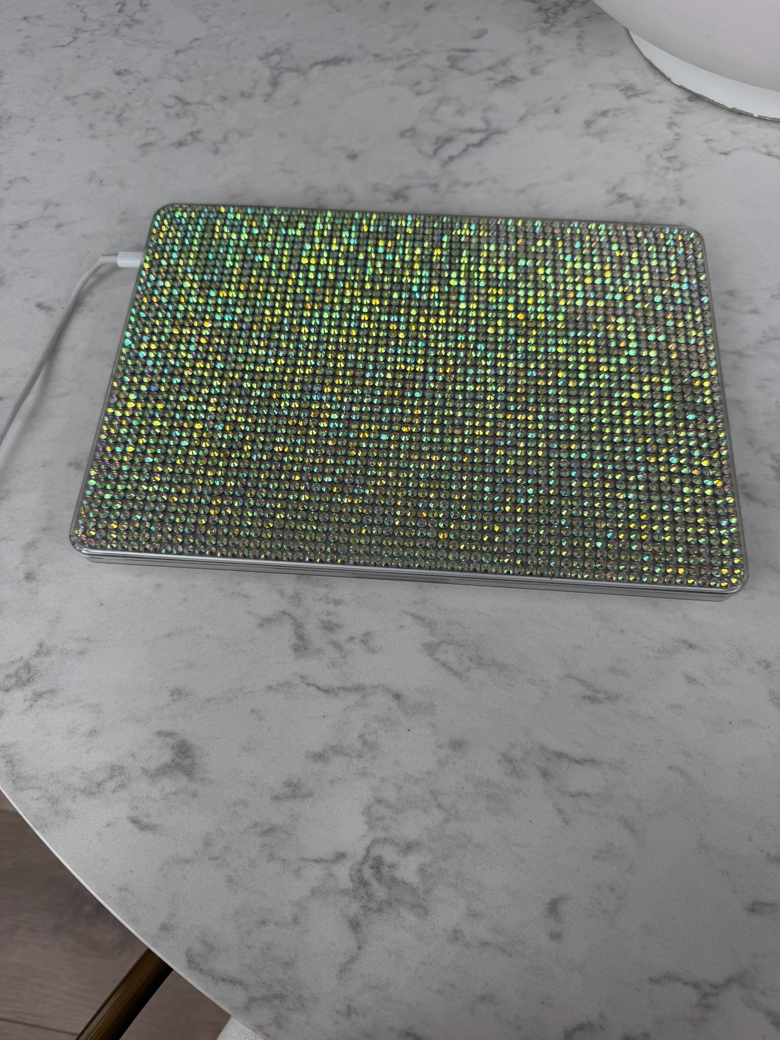Bedazzled laptop case ￼

#LTKvlog #LTKU #LTKHome