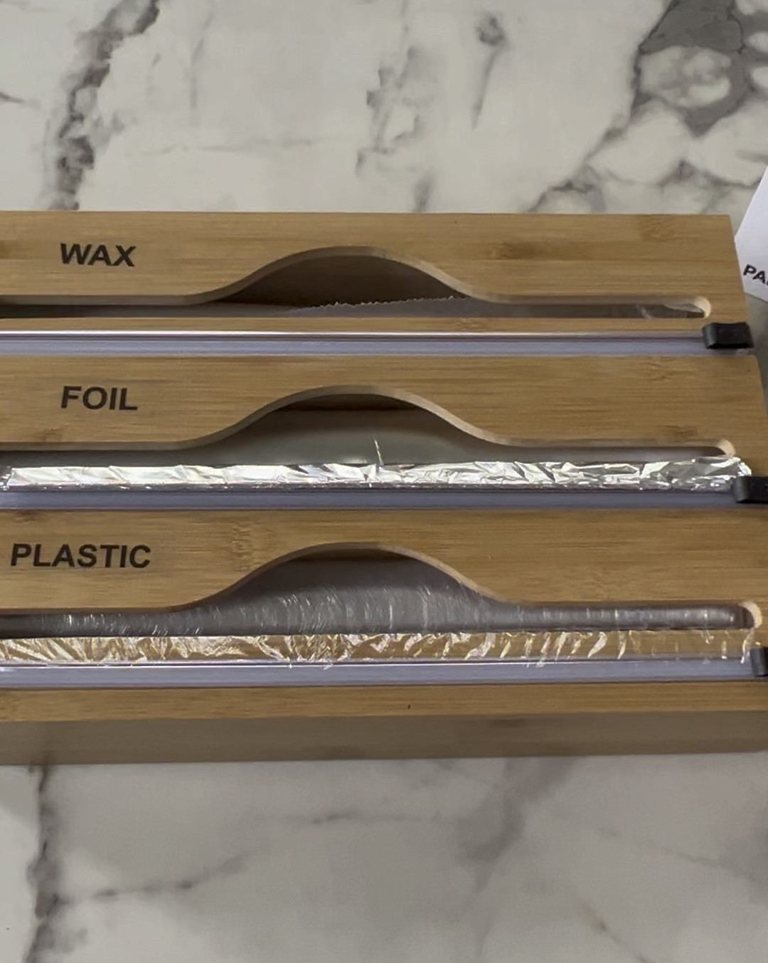 Store your aluminum foil, parchment paper and plastic wrap in this easy to use esthetic container! Comes with labels!

#LTKhome #LTKfindsunder50