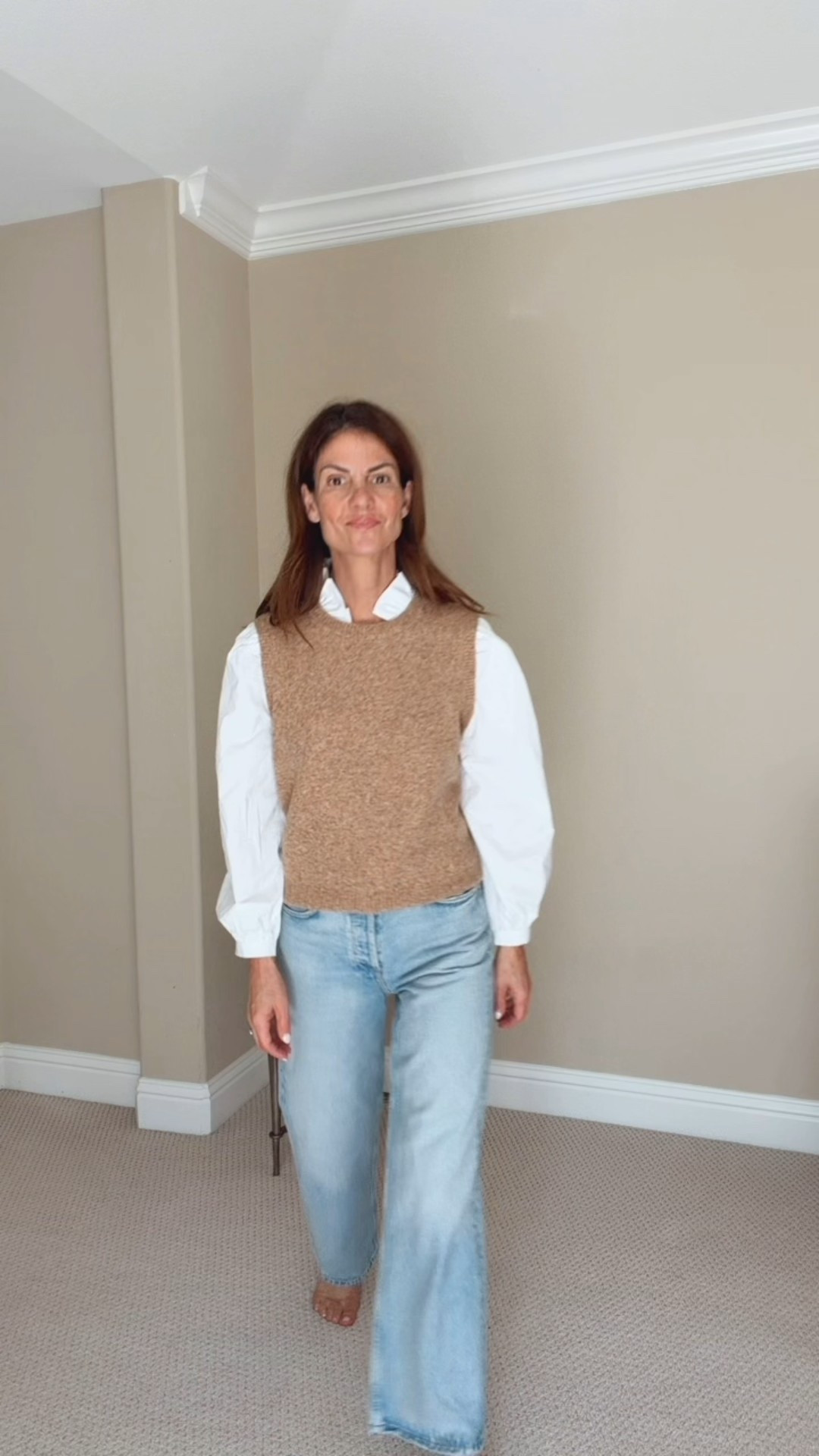 Style inspiration for midlife women — classy, wearable, and effortless. Just an easy neutral outfit I keep reaching for from Tuckernuck. 
Wide-leg jeans with no stretch that fit tts, a two-in-one blouse, affordable mules, a short trench, and gold jewelry.to finish it off.  

I'm 5'7" wearing a small top and size 25 jeans. 

#LTKStyleTip #LTKFindsUnder100 #LTKOver40