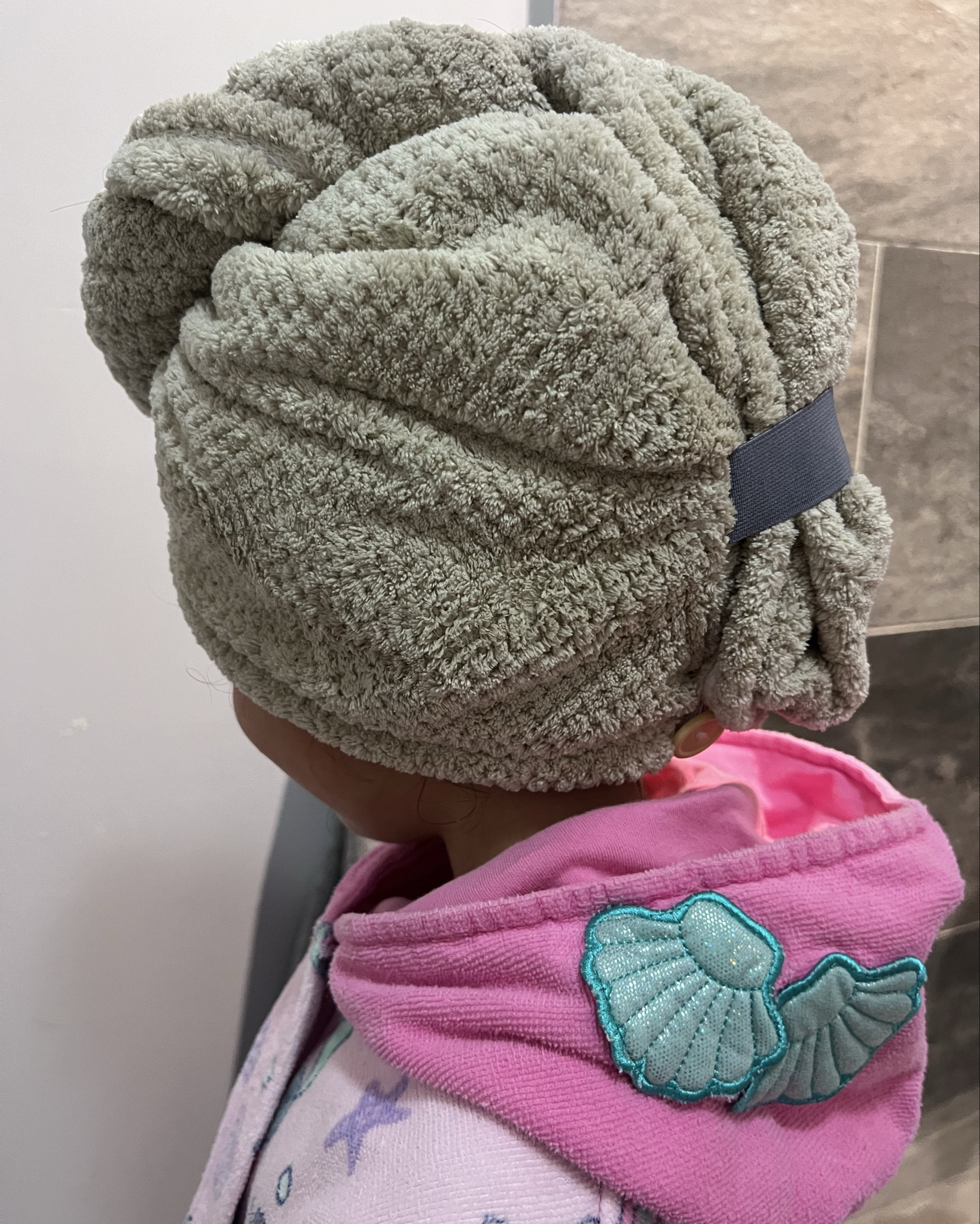 This hair towel absorbs extremely well and dries hair without dripping. The button closure keeps it securely in place. My daughter and I both love it. Must have! 

#LTKGiftGuide #LTKKids #LTKHome