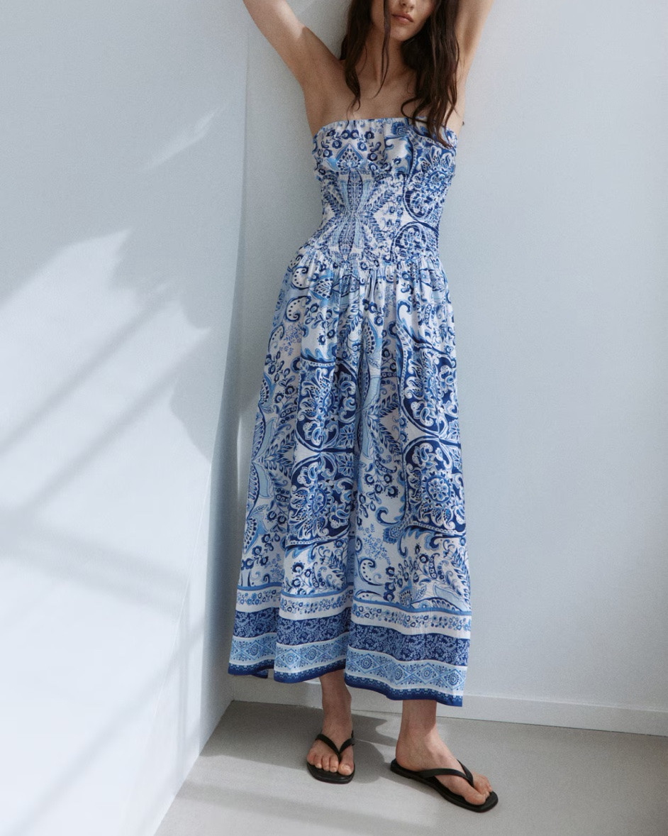 Blue and white patterned smocked strapless midi dress

#LTKSeasonal