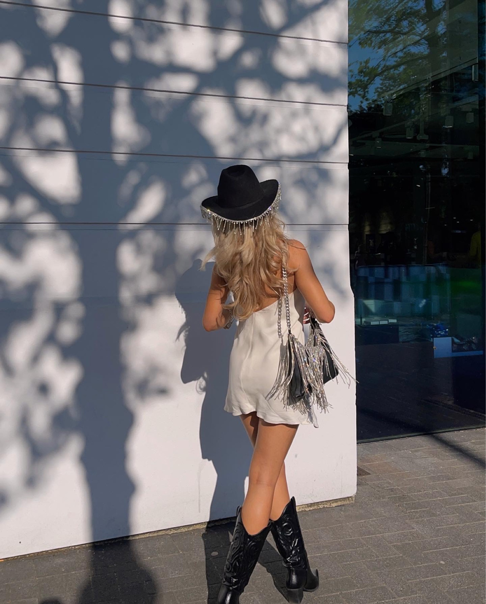 black dress with white cowboy boots blackdress #whiteboots #turquoise #blackandwhite #velvetdress #vintagestyle  #nightout #sexyoutfit