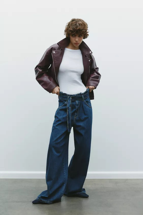 Cropped biker-style jacket with a lapel collar and long sleeves. Featuring front pockets with met... | Zara UK