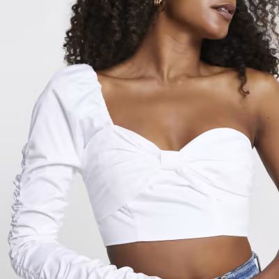 White long sleeve one shoulder bow crop top | River Island (UK & IE)