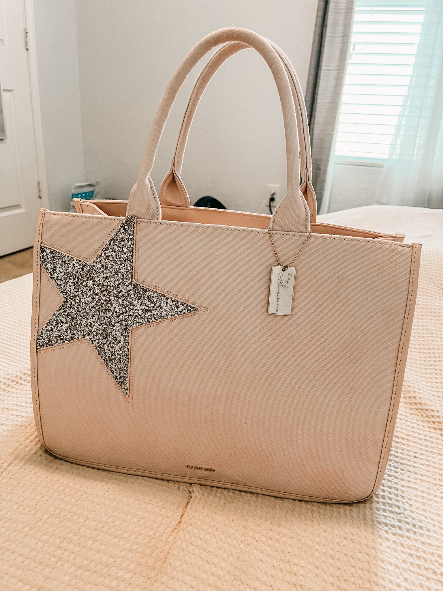 I bought this tote a few weeks ago & it’s my favorite✨ it doubles as a cute bag for me/diaper bag! It fits all of my necessities + my daughter’s as well! This tote comes in other colors & styles as well! #totebag #tote #diaperbag #vintagehavana 

#LTKsalealert #LTKitbag #LTKstyletip