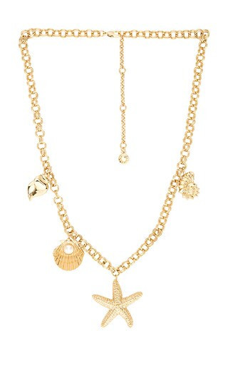 BaubleBar Seashell Charm Necklace in Metallic Gold. | Revolve Clothing (Global)