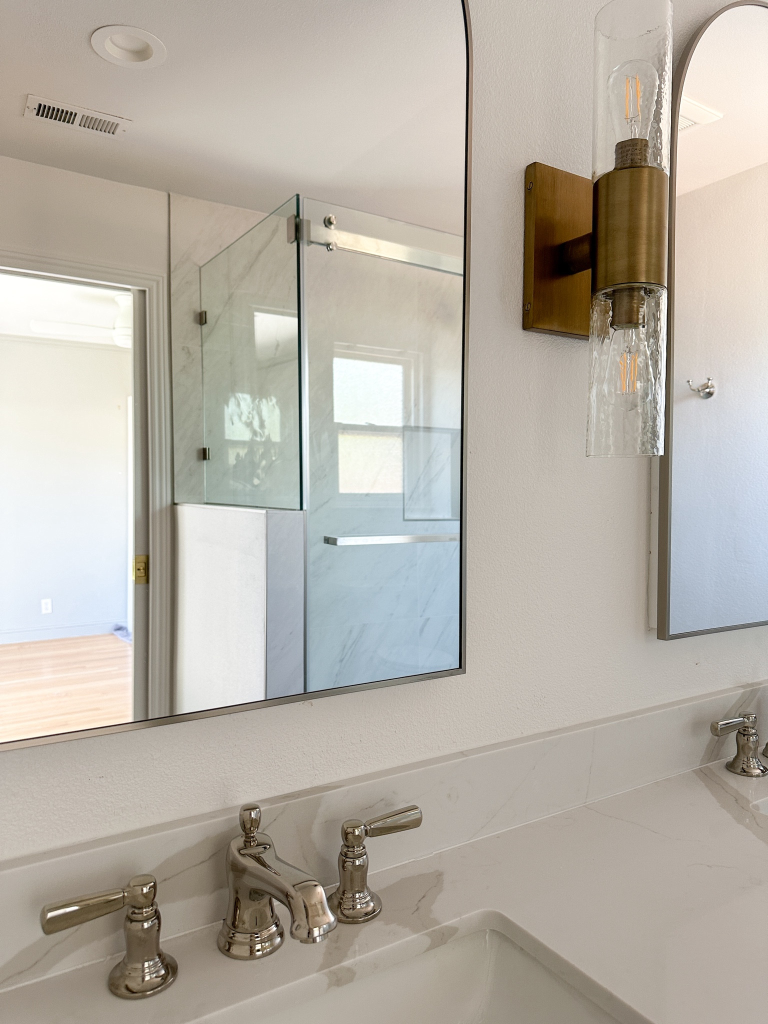 Bathroom remodel; arched medicine cabinets