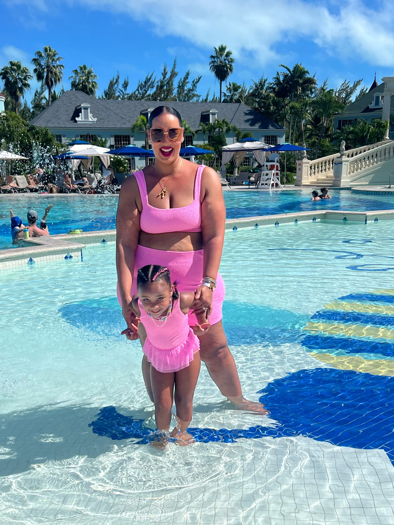 Mommy and me matching swimsuits from show me your mumu. Size down in these adult size 

#LTKKids #LTKFamily #LTKSwim