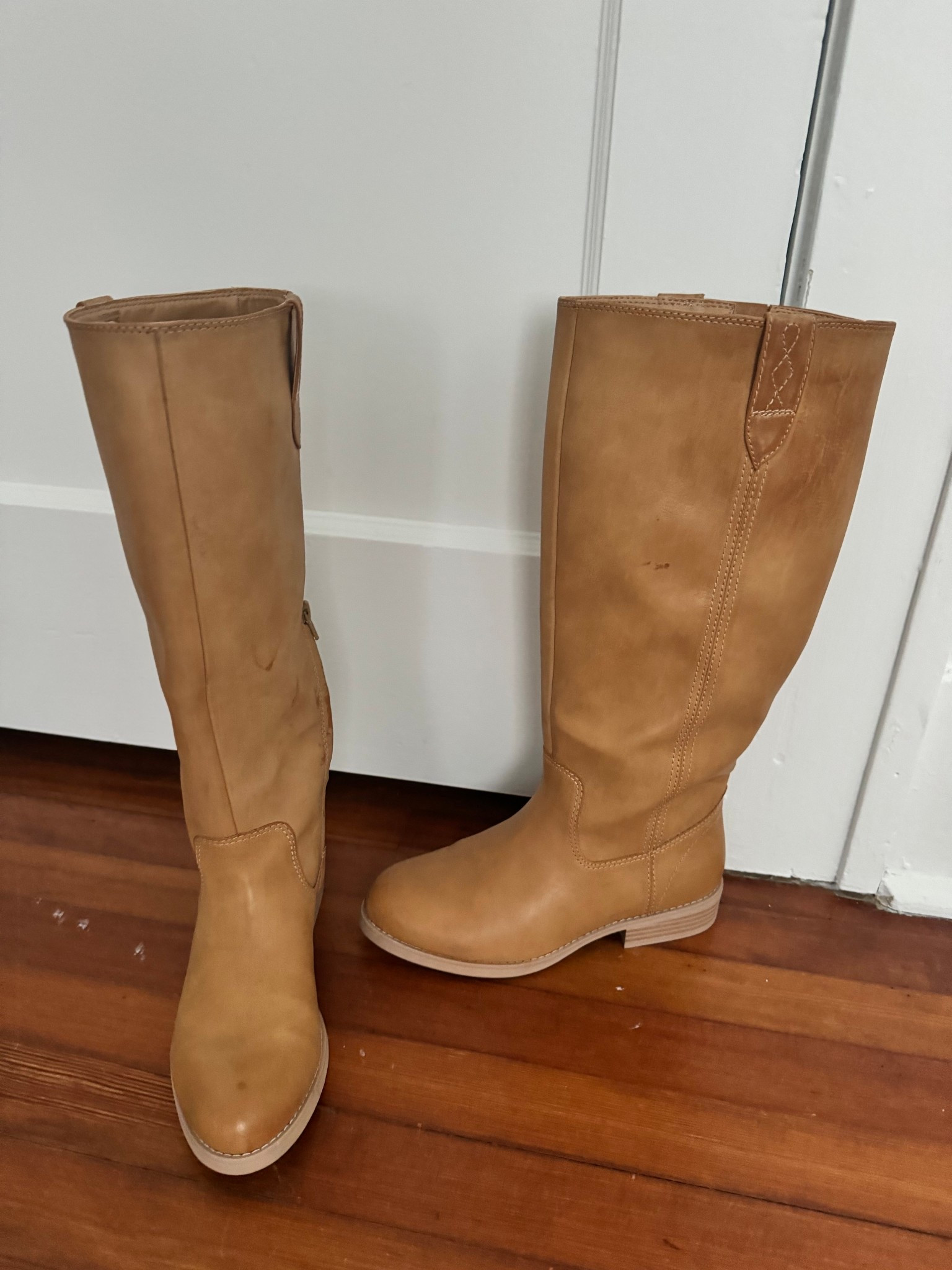 Trendy fall tan boots. So comfy I got so many compliments on them! I got a wide calf for I wider look

#LTKStyleTip #LTKSeasonal #LTKMidsize