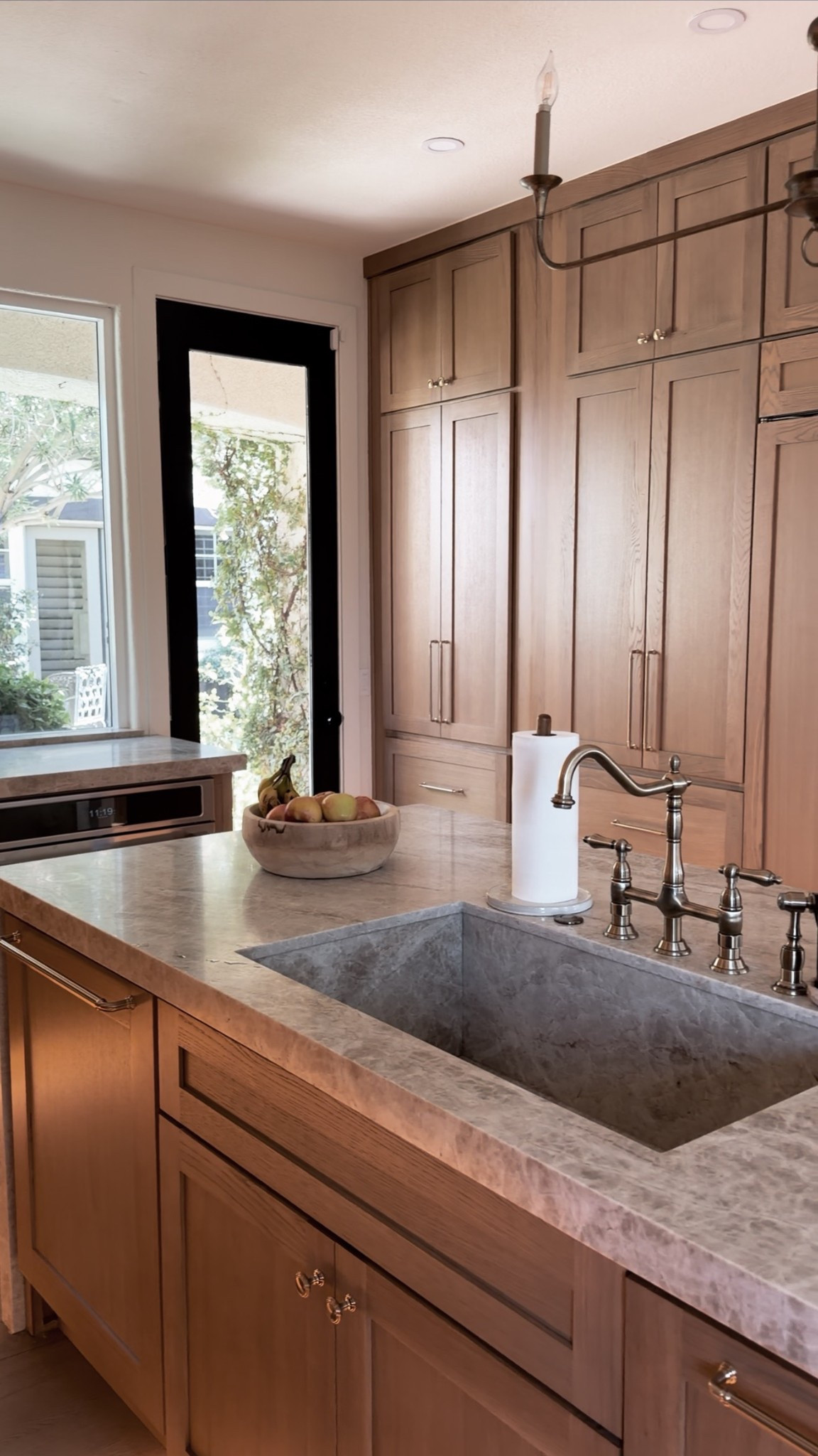 Kitchen island

Stone: Leathered taj mahal 
Cabinets: White oak, rift sawn, medium stain

#LTKHome