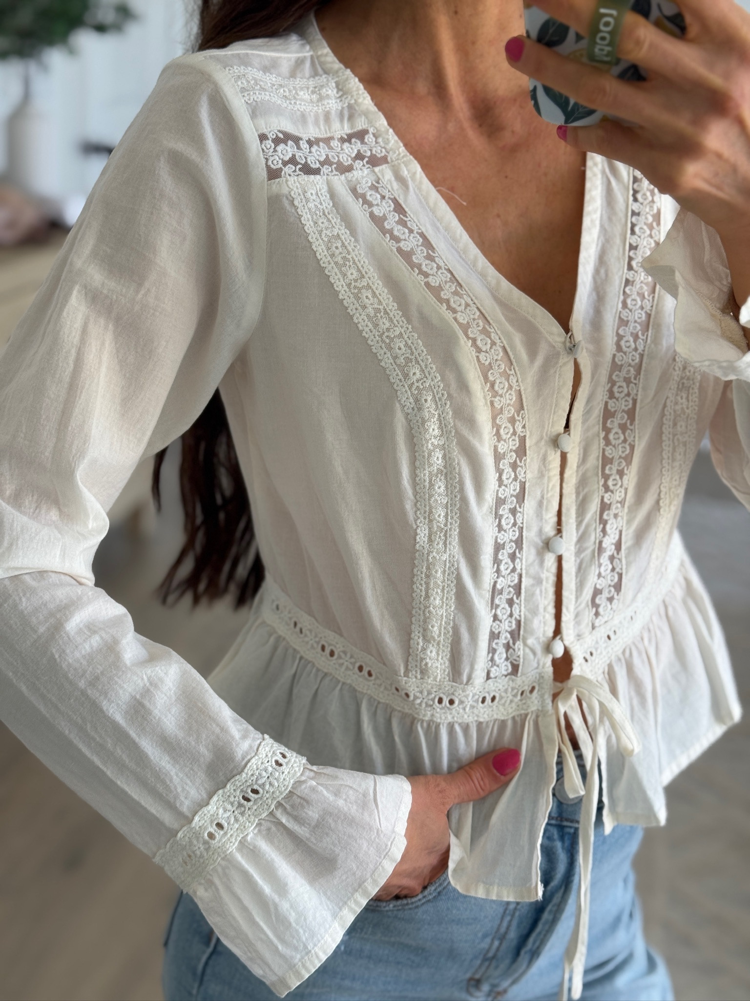 Such a pretty, feminine top with all the best details. The lace trim, button front, and peplum fit make it feel elevated while still being easy to style with your favorite denim.

Everything is linked for you to shop.

white blouse, feminine top, lace detail, peplum top, spring outfit, casual chic, everyday style, light and airy, long sleeve blouse, effortless outfit, mom style, neutral outfit, pretty details

#LTKSeasonal #LTKgrwm #LTKootd