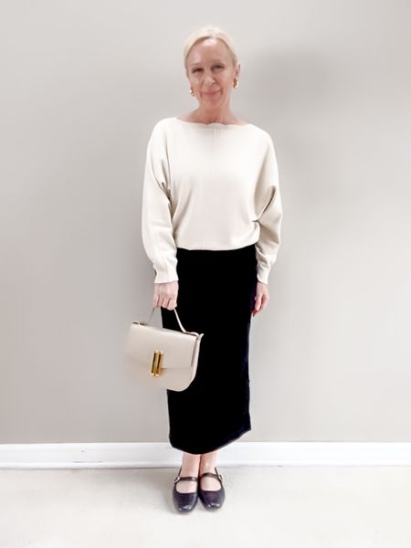 Ivory dolman sweater paired with a velvet midi skirt for a Christmas party outfit or holiday party outfit  

#LTKover40 #LTKfindsunder50 #LTKHoliday