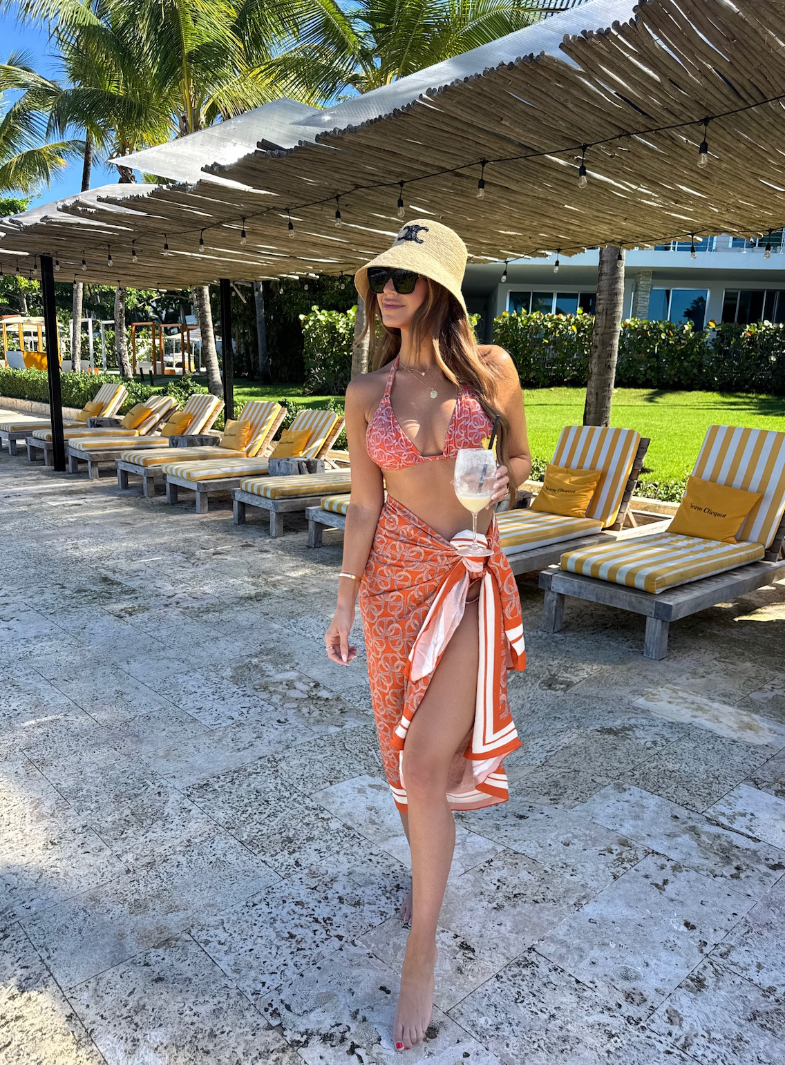 obsessing over this look 🧡 wearing a large top and small bottoms! 

 #LTKootd #LTKTravel