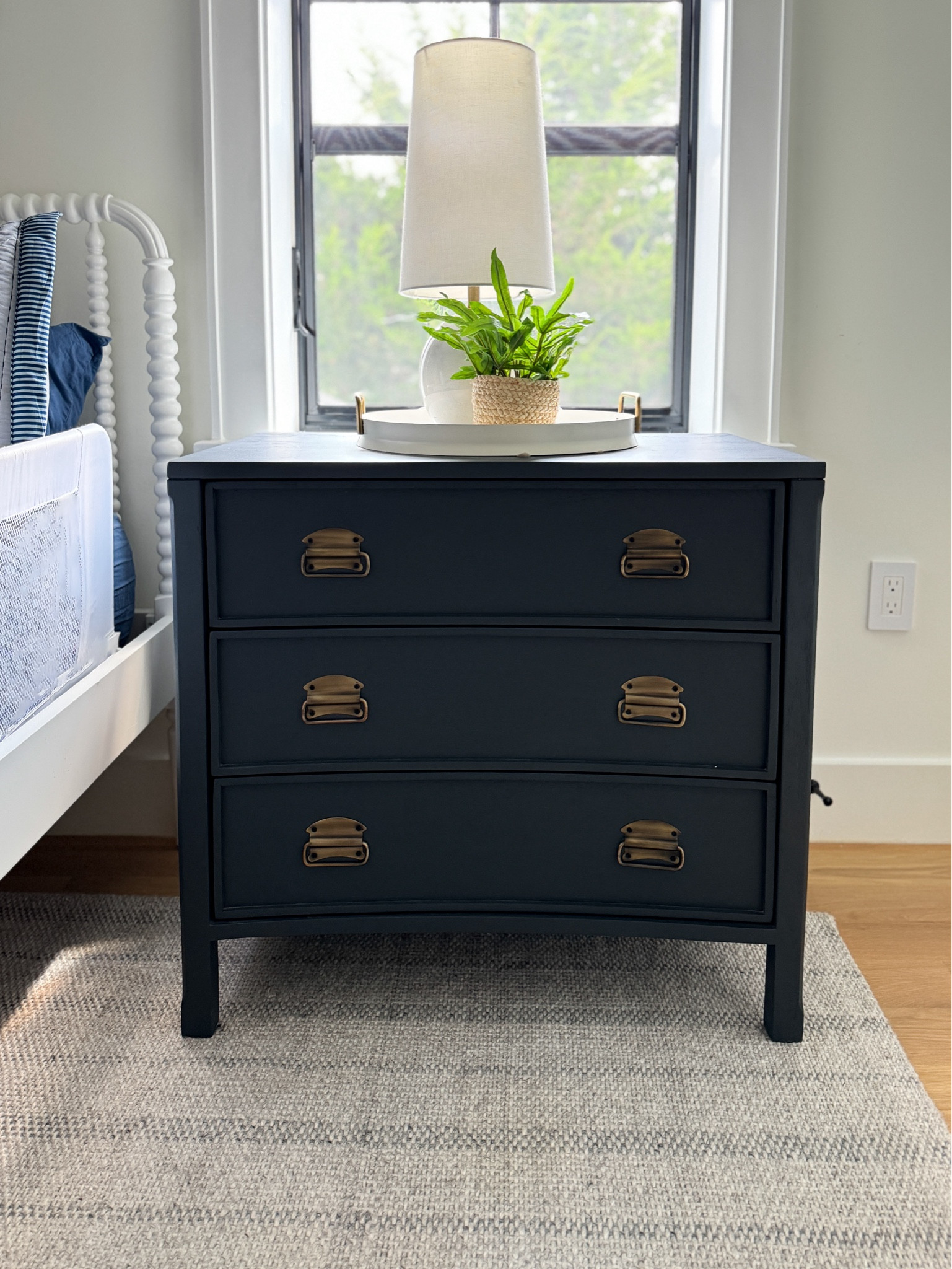 On sale for Labor Day weekend!
My sons navy 3 drawer nightstand from McGee & Co. Boys room design, gray striped rug, white navy gray bedroom design 